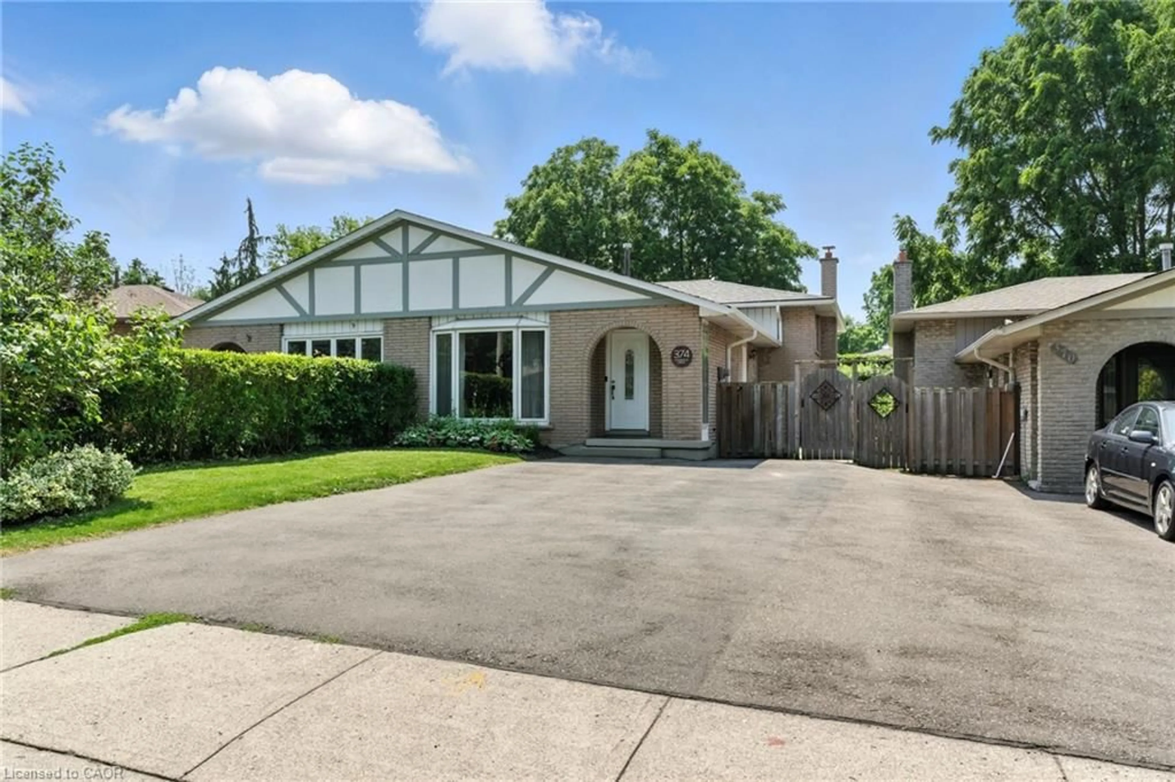 Home with vinyl exterior material, street for 374 Magnolia Dr, Hamilton Ontario L9C 6N7