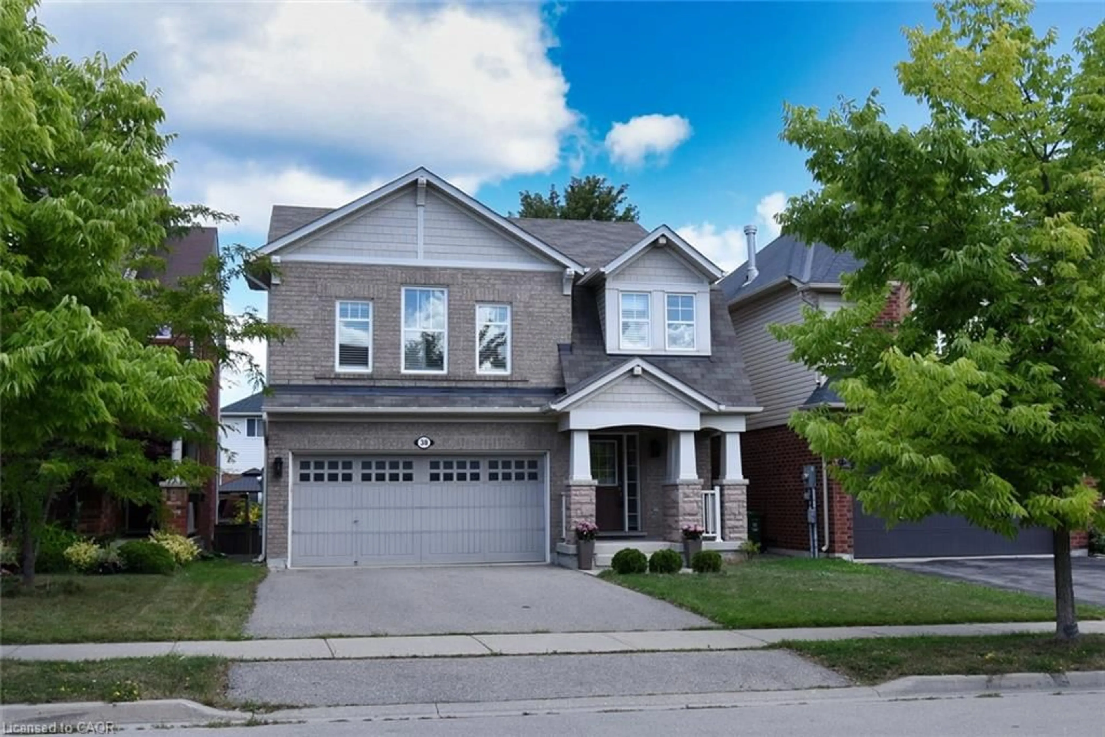 Home with vinyl exterior material, street for 38 Cranston St, Ancaster Ontario L9K 0E3