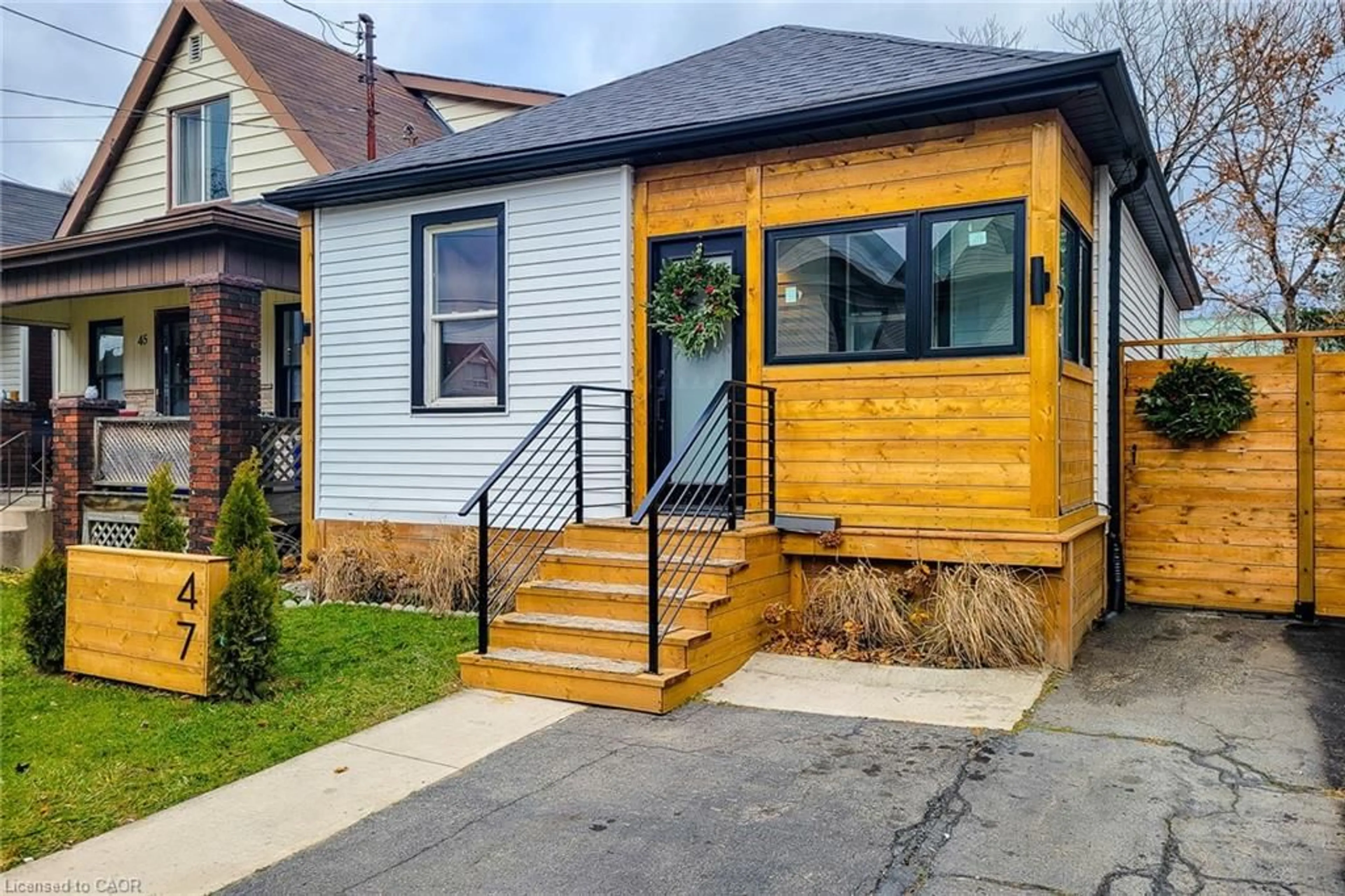 Home with vinyl exterior material, street for 47 Gertrude St, Hamilton Ontario L8L 4B7