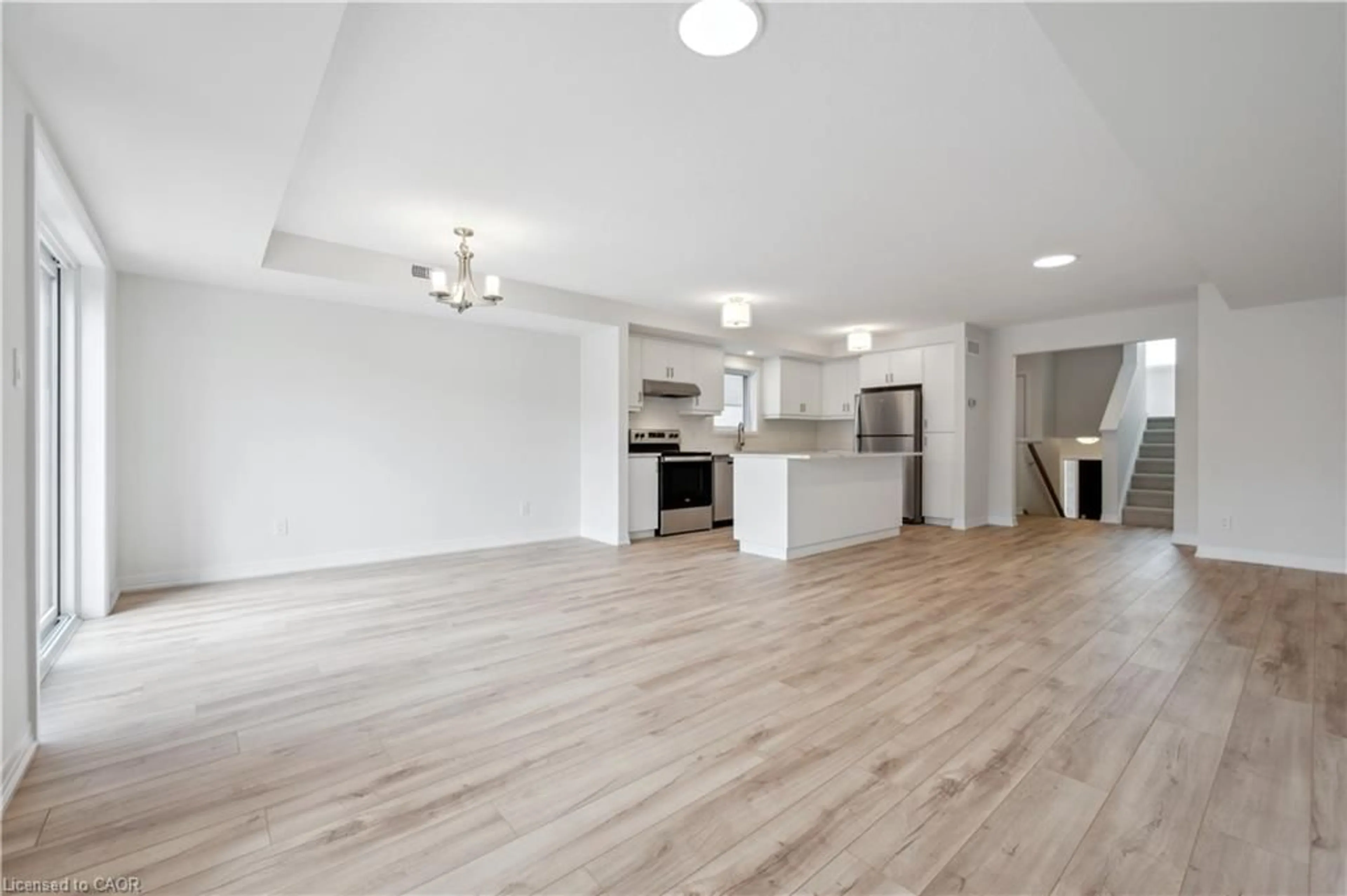 Open concept kitchen, wood/laminate floor for 15 Stauffer Woods Trail #C9, Kitchener Ontario N2P 2P4