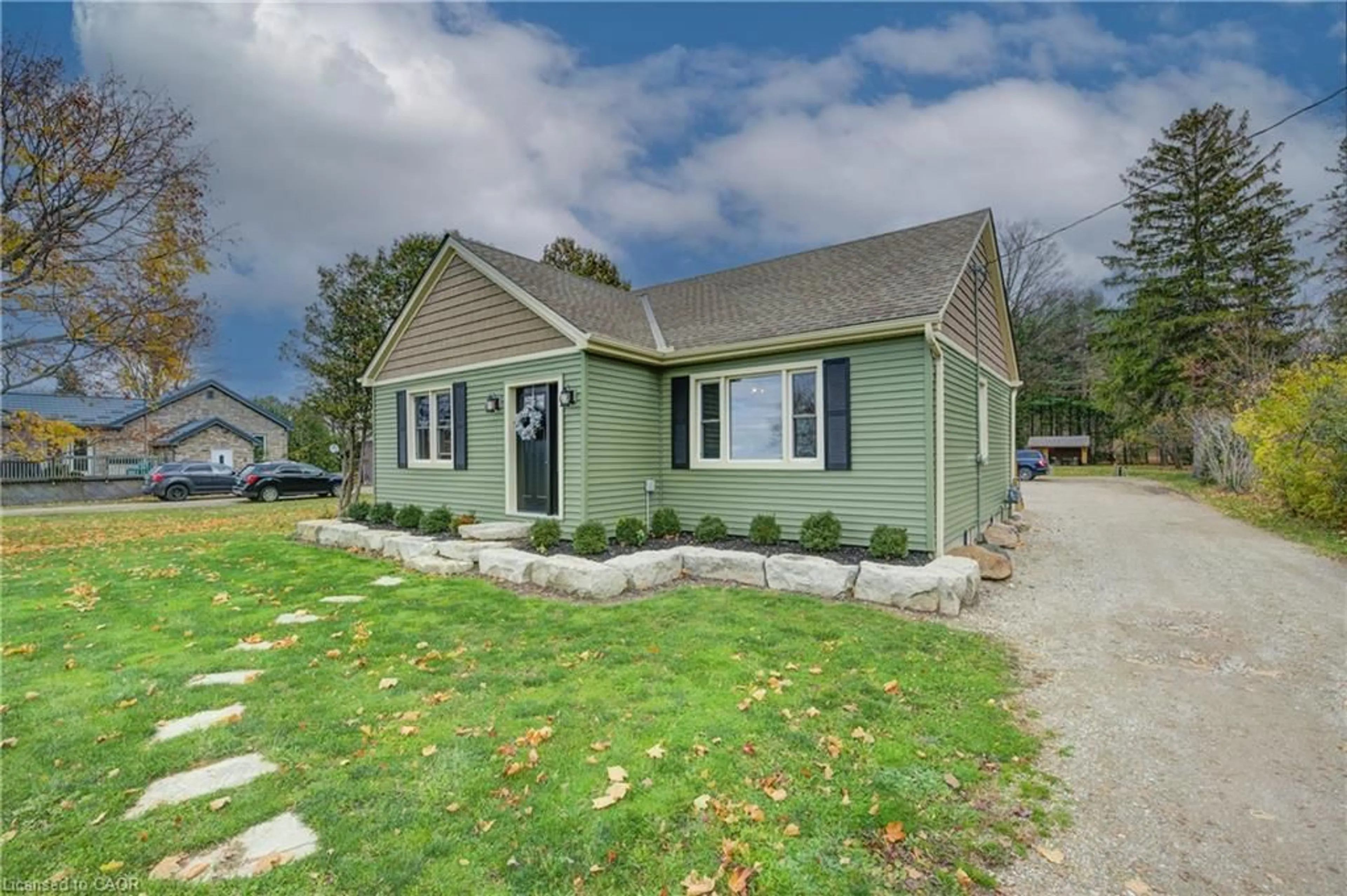 Home with vinyl exterior material, street for 332508 Plank Line, Ostrander Ontario N4G 4H1