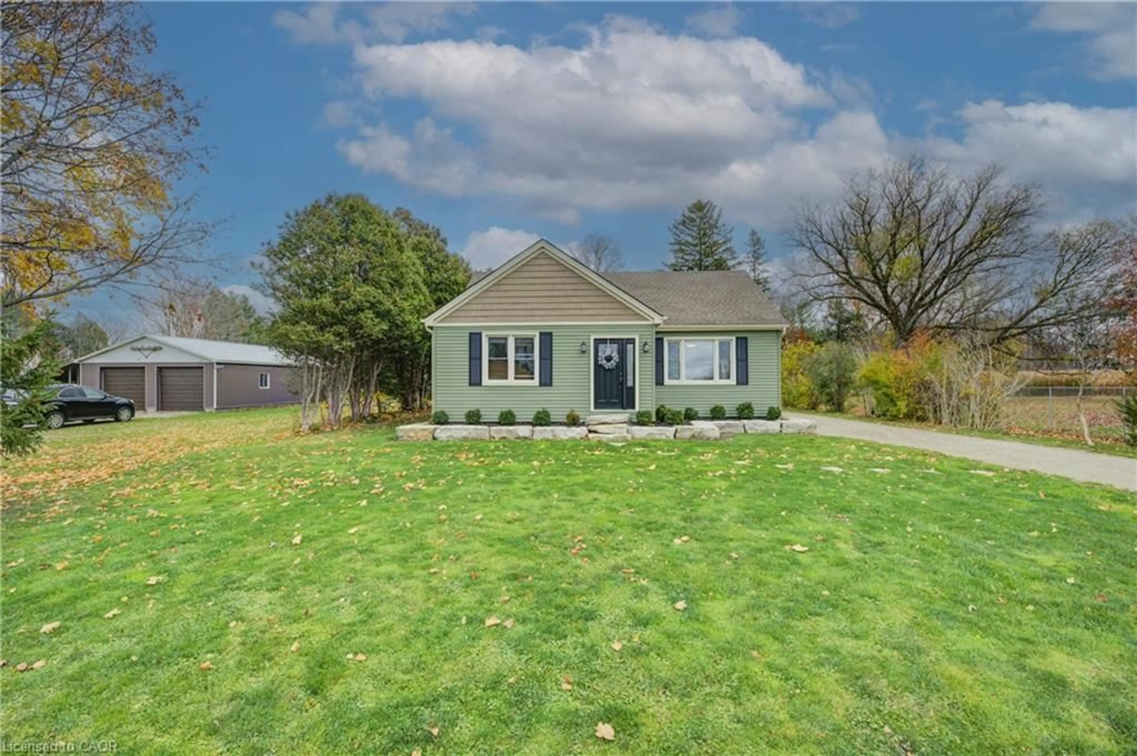 A pic from outside/outdoor area/front of a property/back of a property/a pic from drone, street for 332508 Plank Line, Ostrander Ontario N4G 4H1