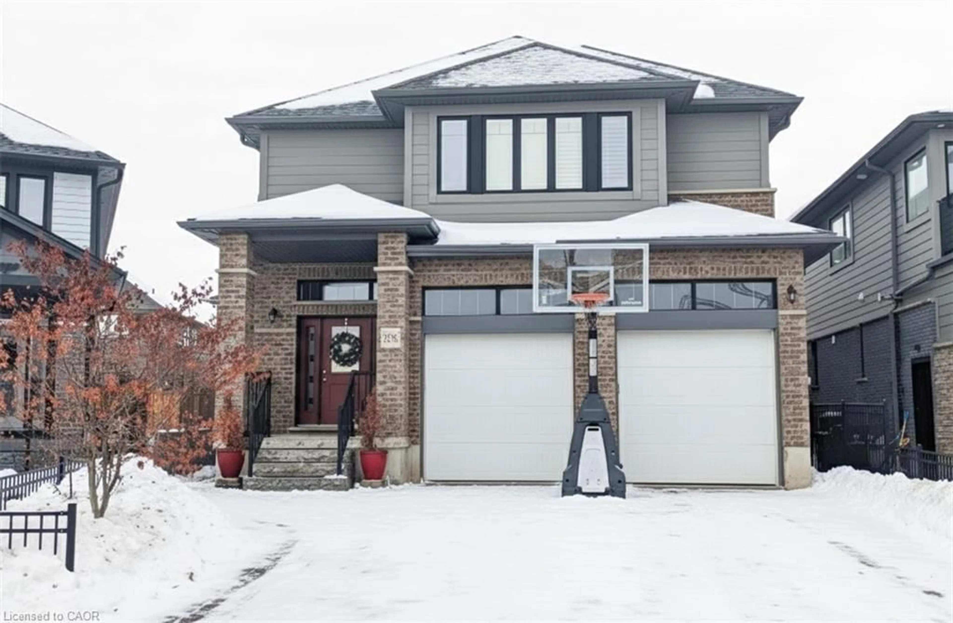 Home with brick exterior material, street for 206 Carriage Way, Waterloo Ontario N2K 0C6