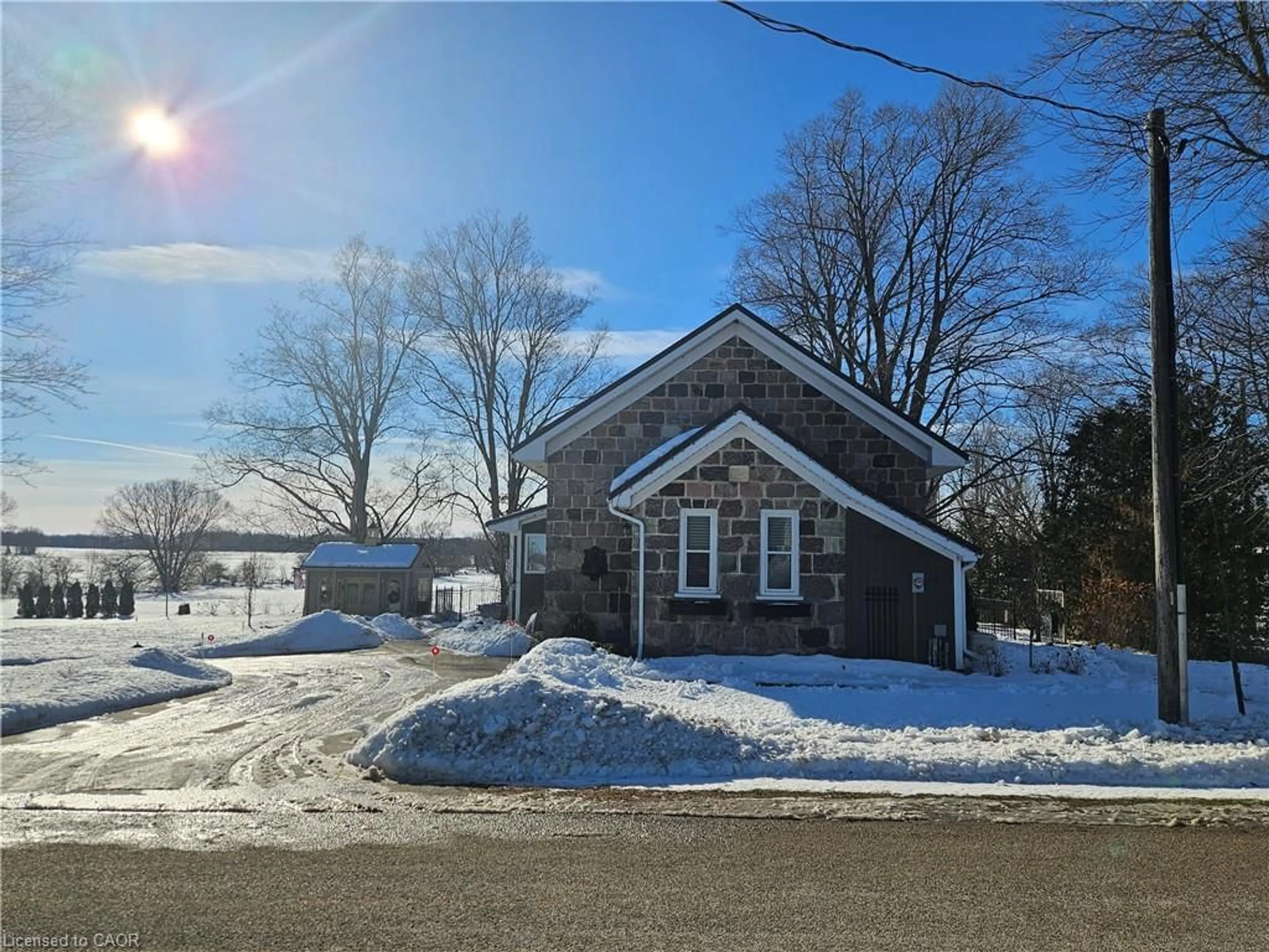 A pic from outside/outdoor area/front of a property/back of a property/a pic from drone, street for 6265 Line 89, Gowanstown Ontario N0G 1Y0