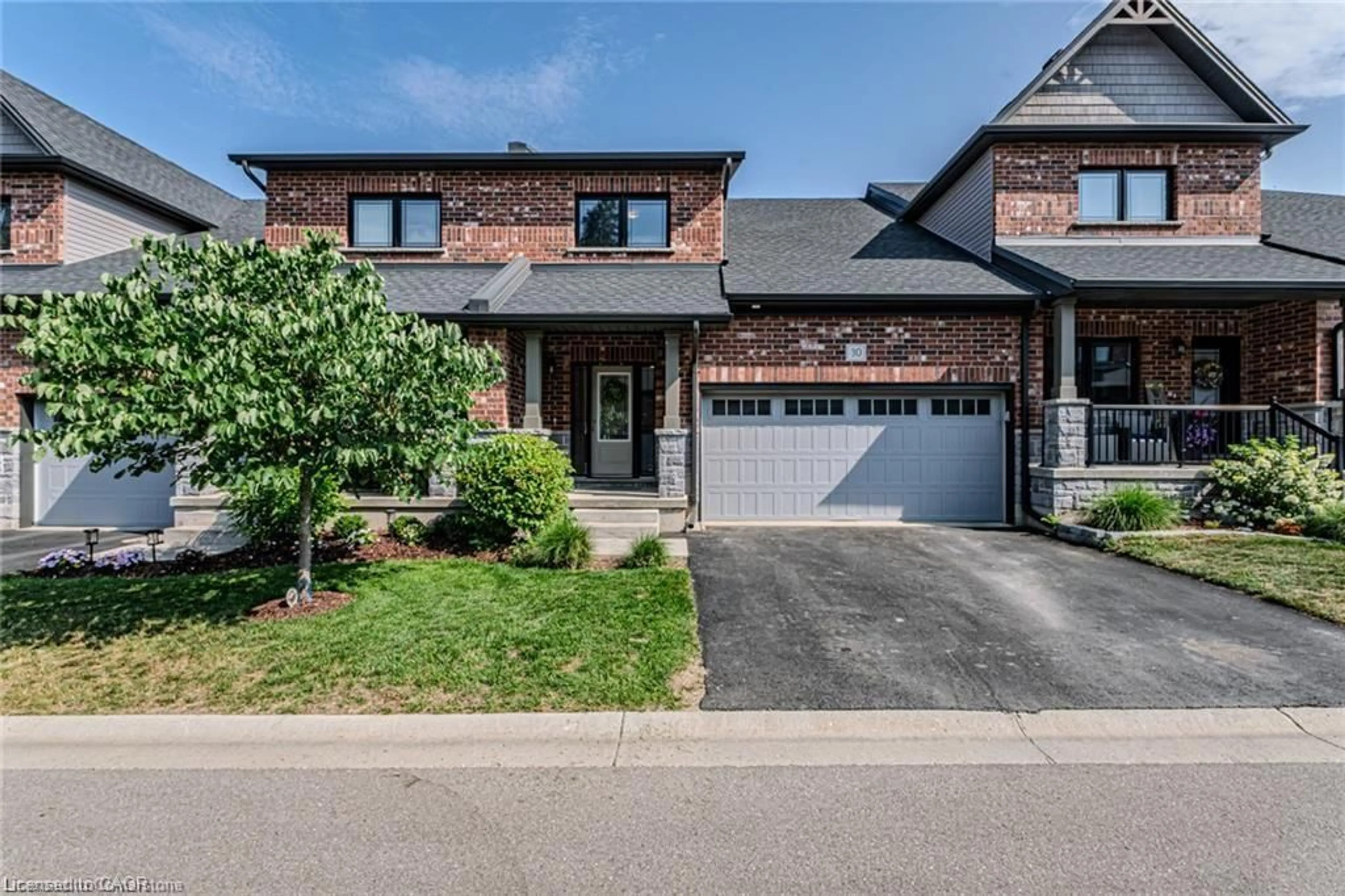 Home with brick exterior material, street for 30 Serviceberry Lane #34, Simcoe Ontario N3Y 0E7