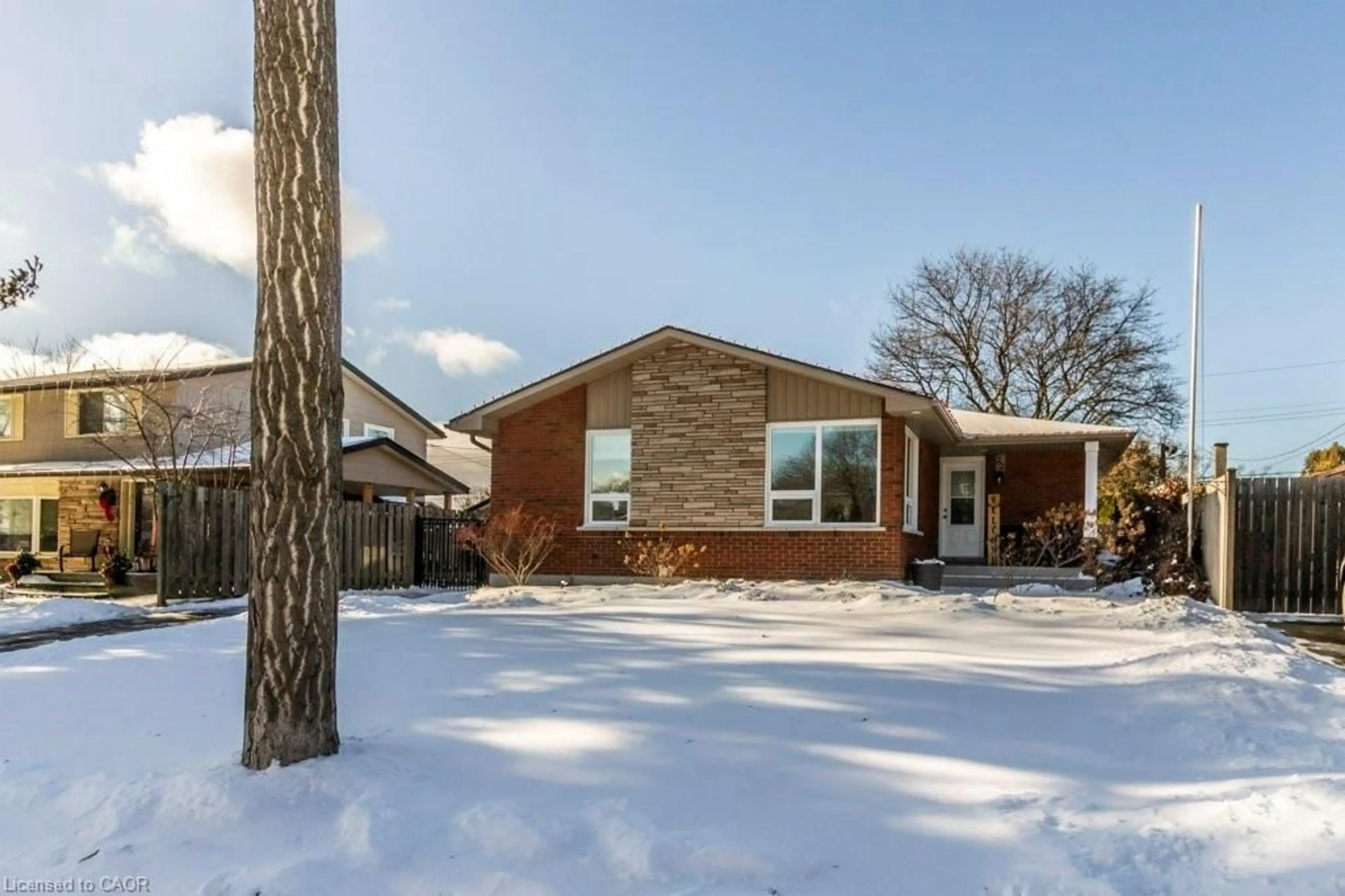 Home with brick exterior material, street for 22 Redwing Rd, Hamilton Ontario L9A 3Y9