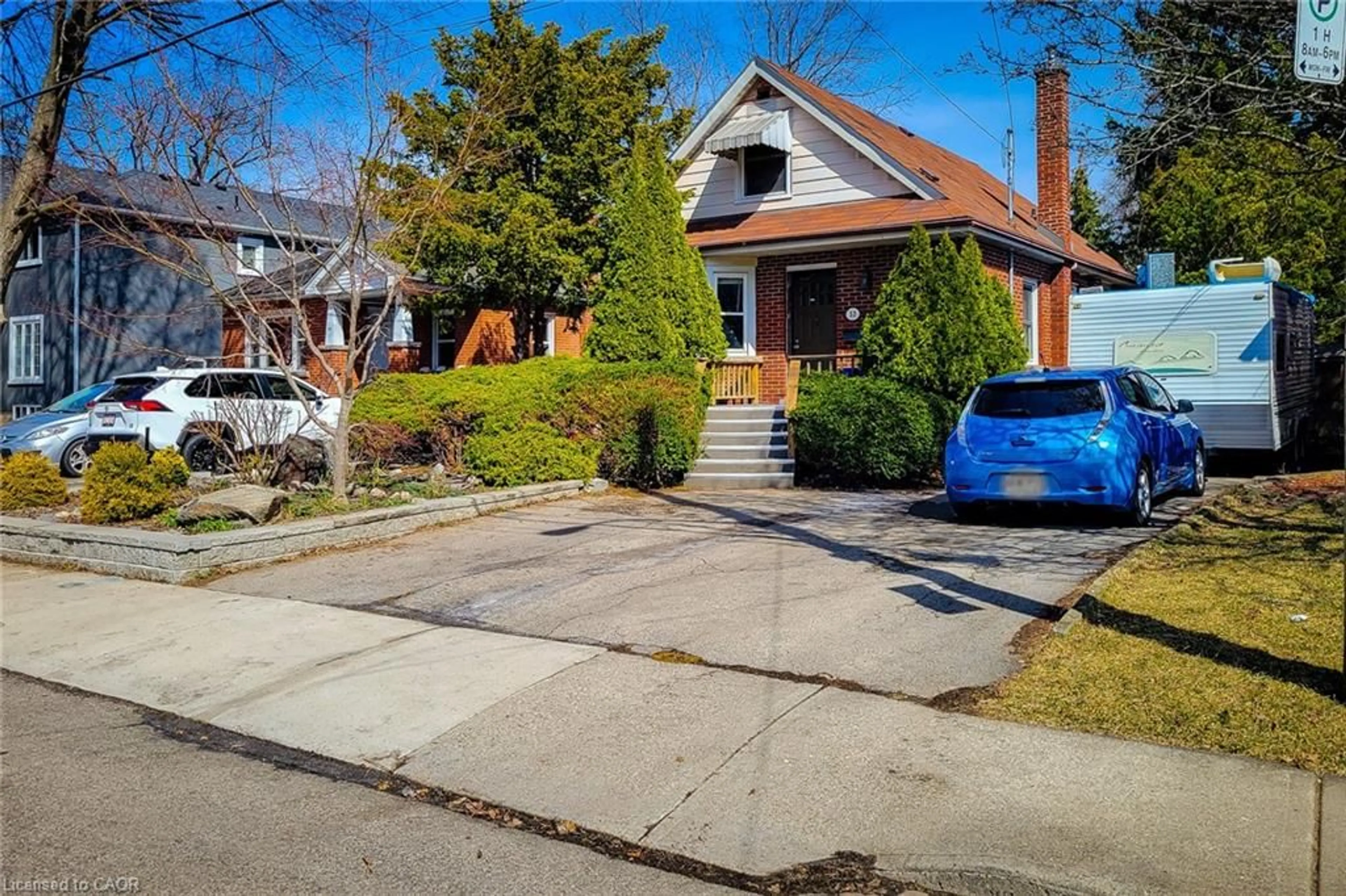 Home with brick exterior material, street for 33 Norfolk St, Hamilton Ontario L8S 3A6