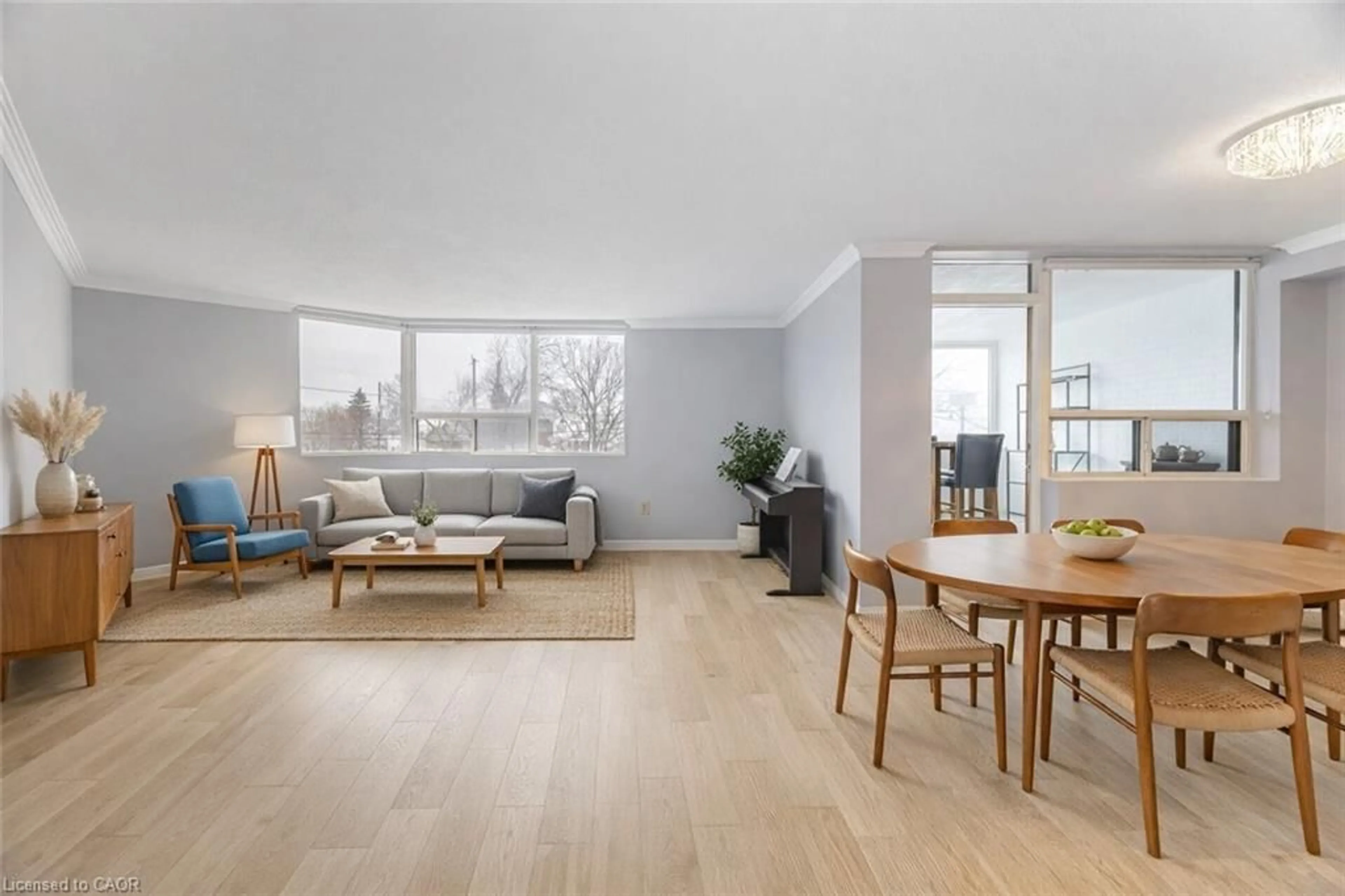 Living room with furniture, wood/laminate floor for 166 Mountain Park Ave #201, Hamilton Ontario L8V 1A1