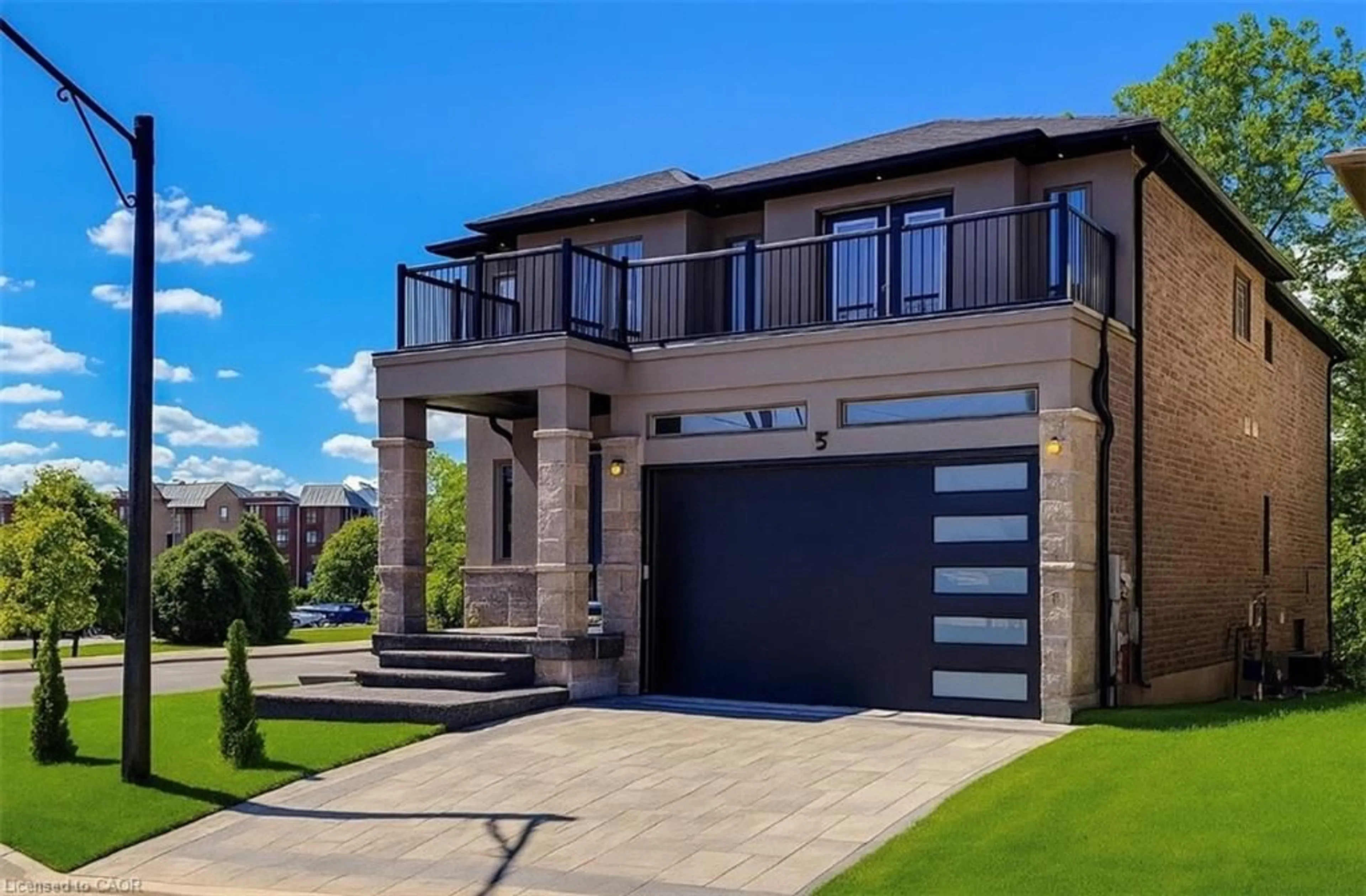 Home with brick exterior material, street for 1261 Mohawk Rd #5, Ancaster Ontario L9G 3K9