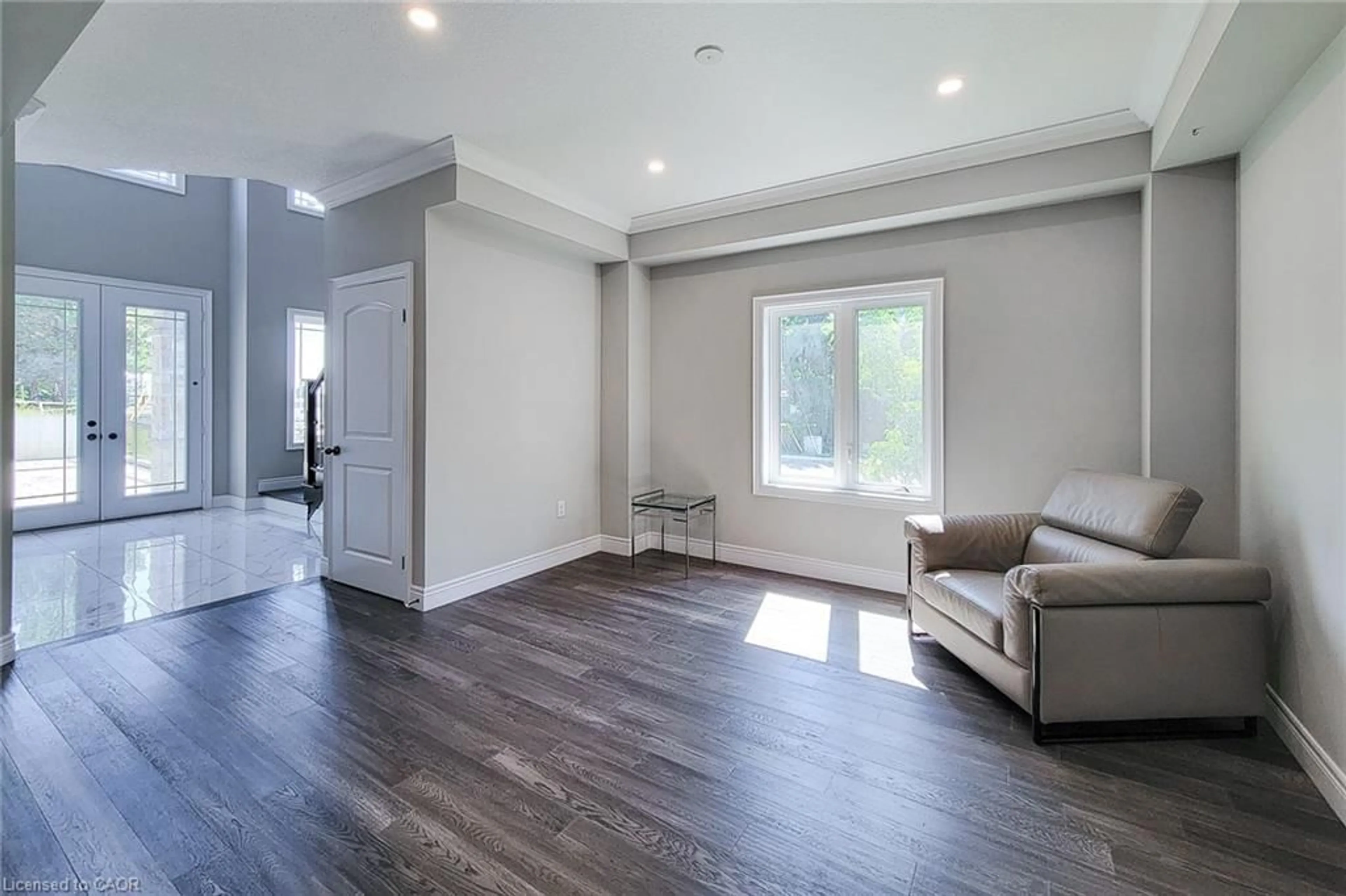 Living room with furniture, wood/laminate floor for 1261 Mohawk Rd #5, Ancaster Ontario L9G 3K9