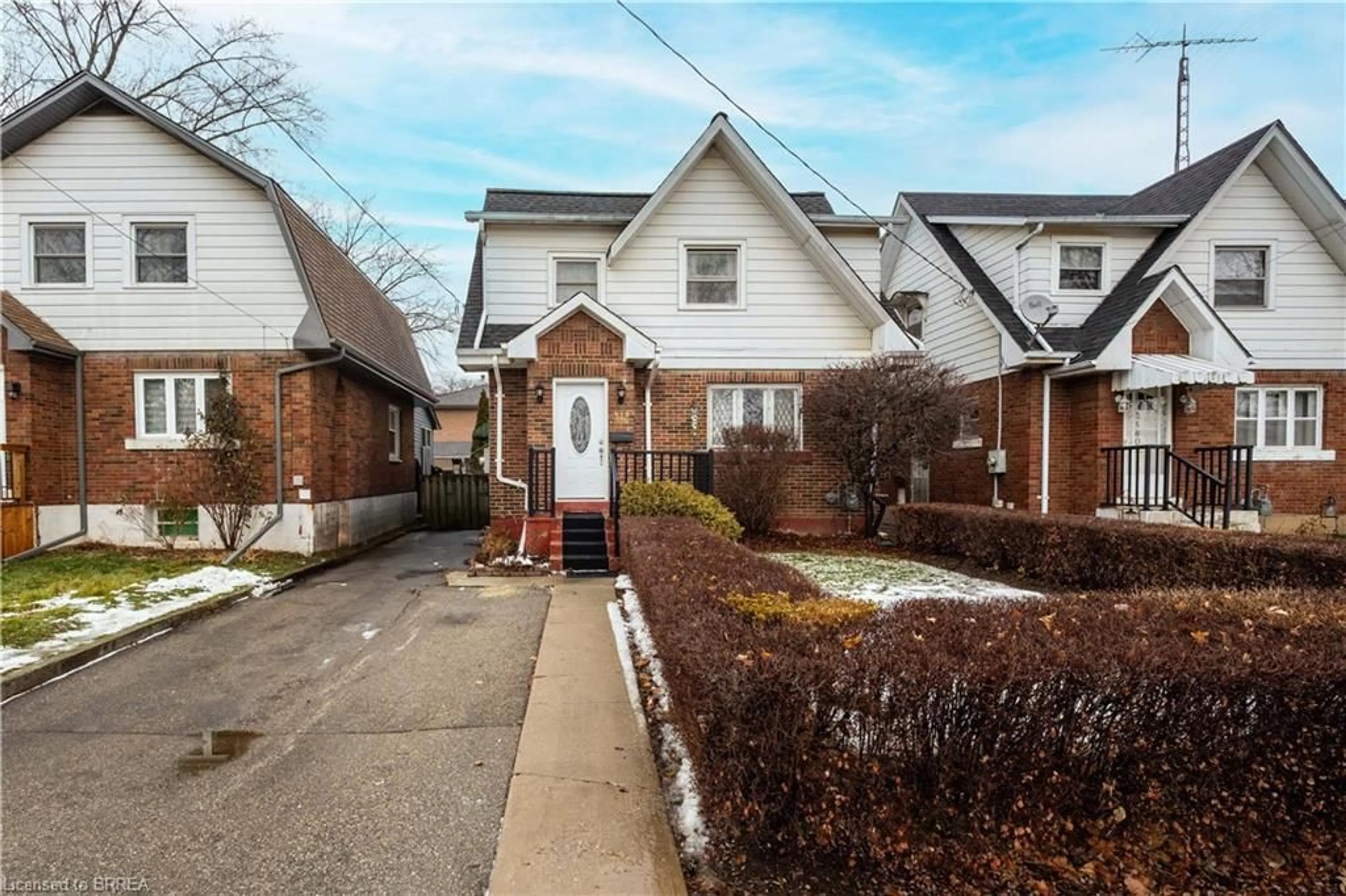 Home with brick exterior material, street for 338 Darling St, Brantford Ontario N3S 3Y3