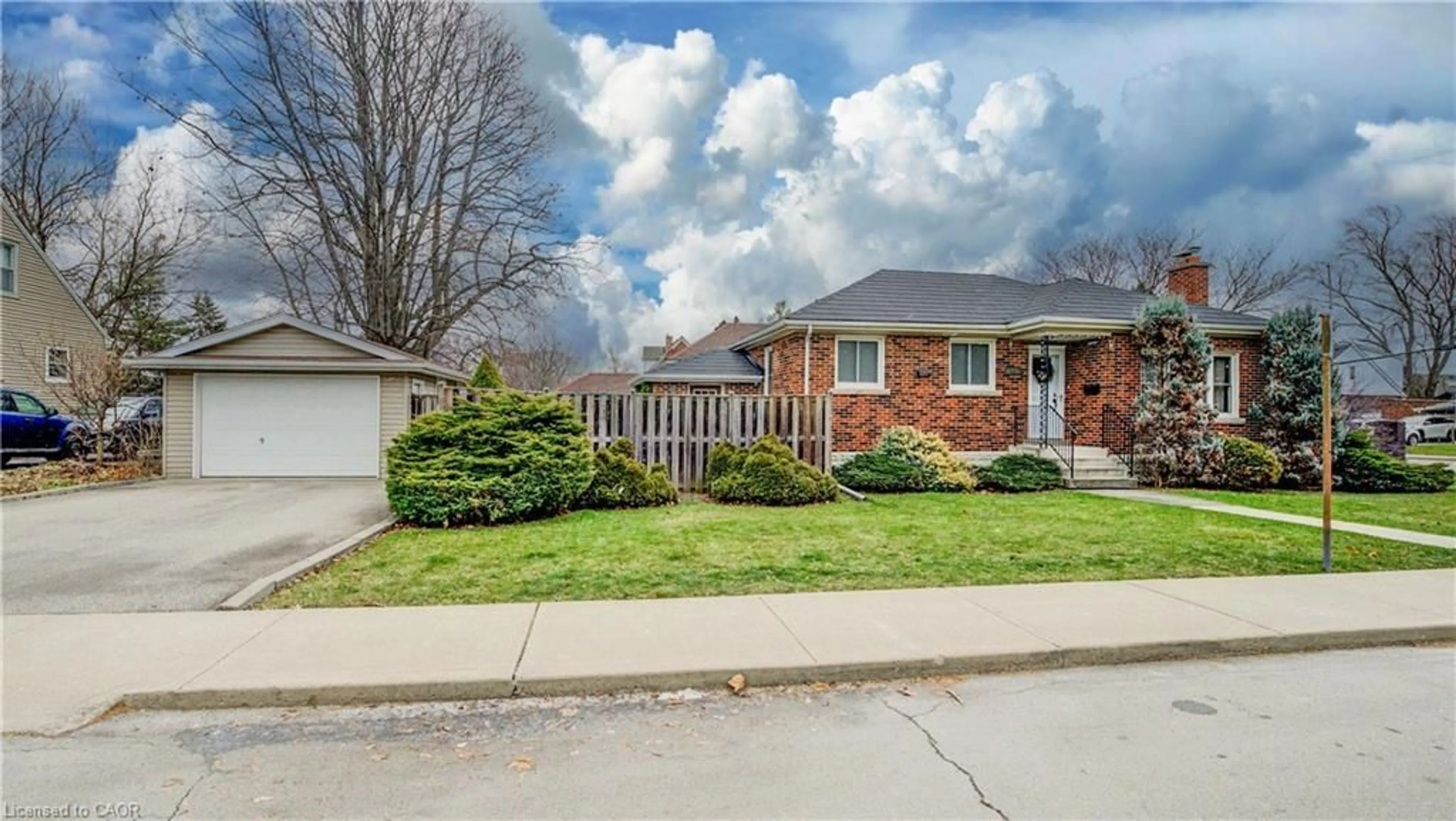 Home with brick exterior material, street for 143 Rosedale Ave, Hamilton Ontario L8K 4N3