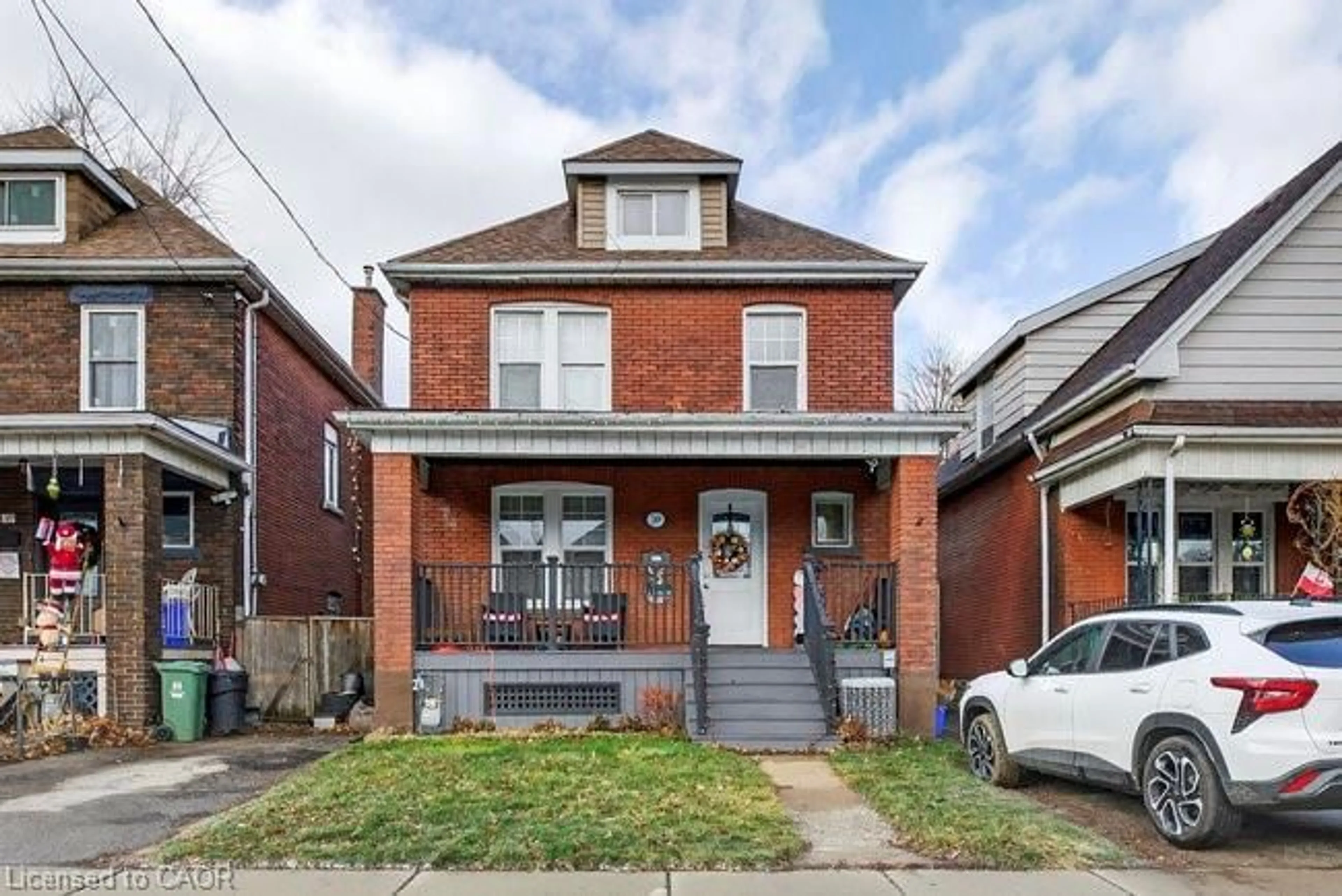 Home with brick exterior material, street for 149 Leinster Ave, Hamilton Ontario L8L 6Y1