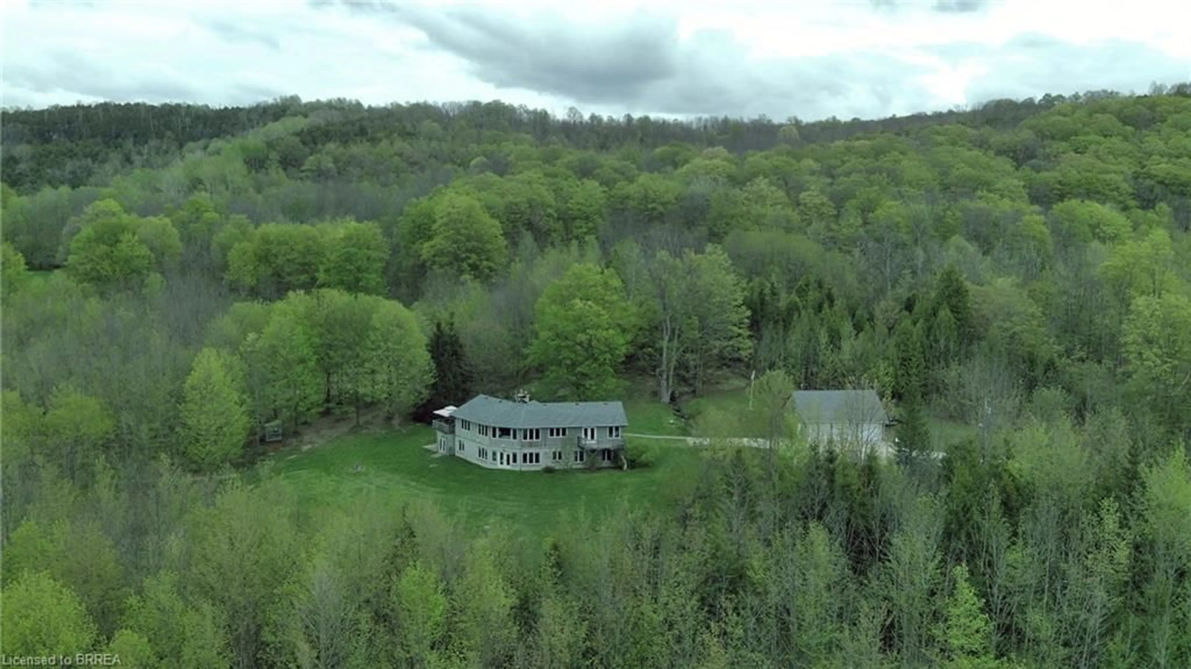 A pic from outside/outdoor area/front of a property/back of a property/a pic from drone, forest/trees view for 546299 Sideroad 4b, Kimberley Ontario N0C 1G0