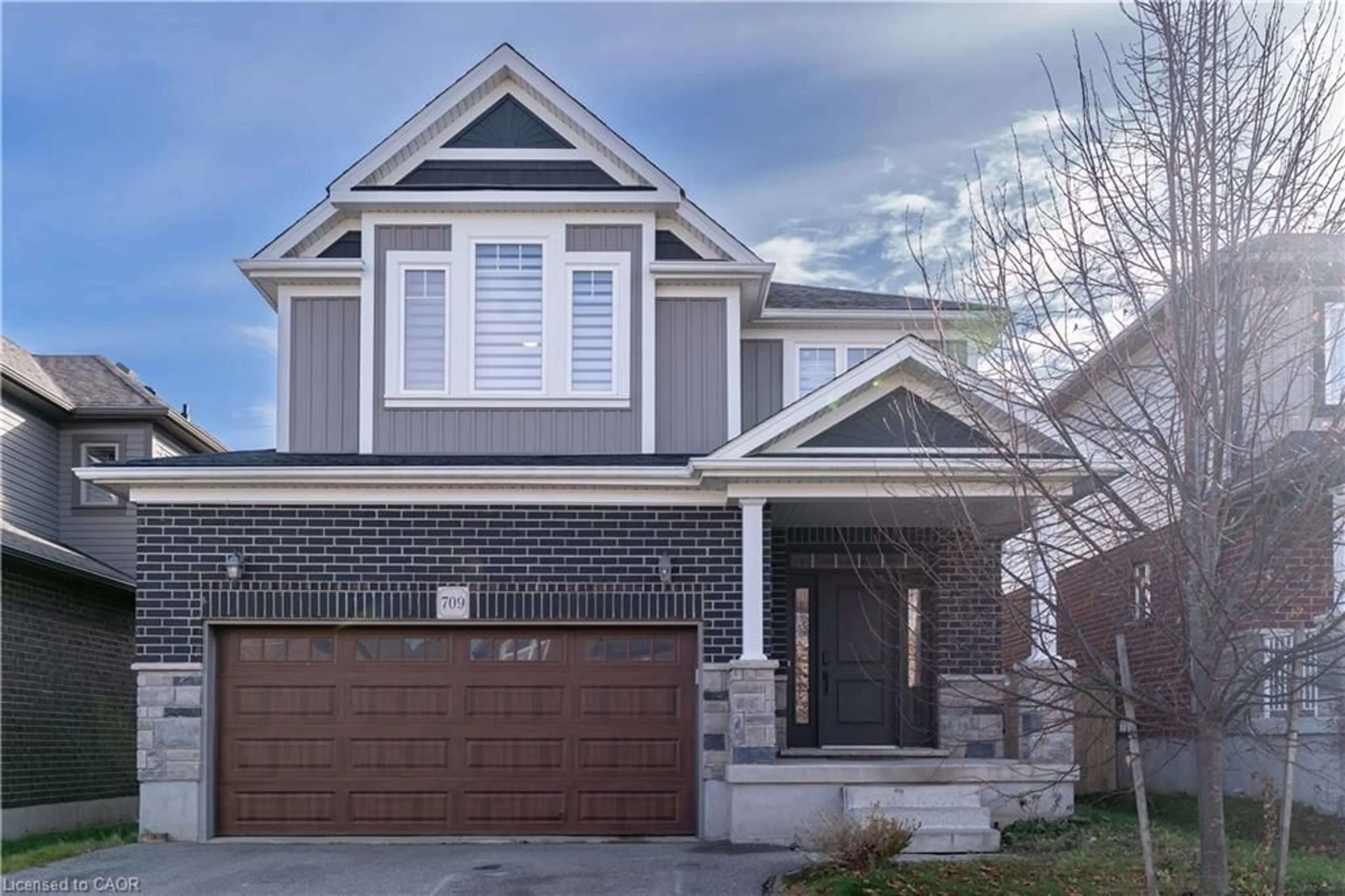 Home with brick exterior material, street for 709 Rock Elm St, Waterloo Ontario N2V 0C3
