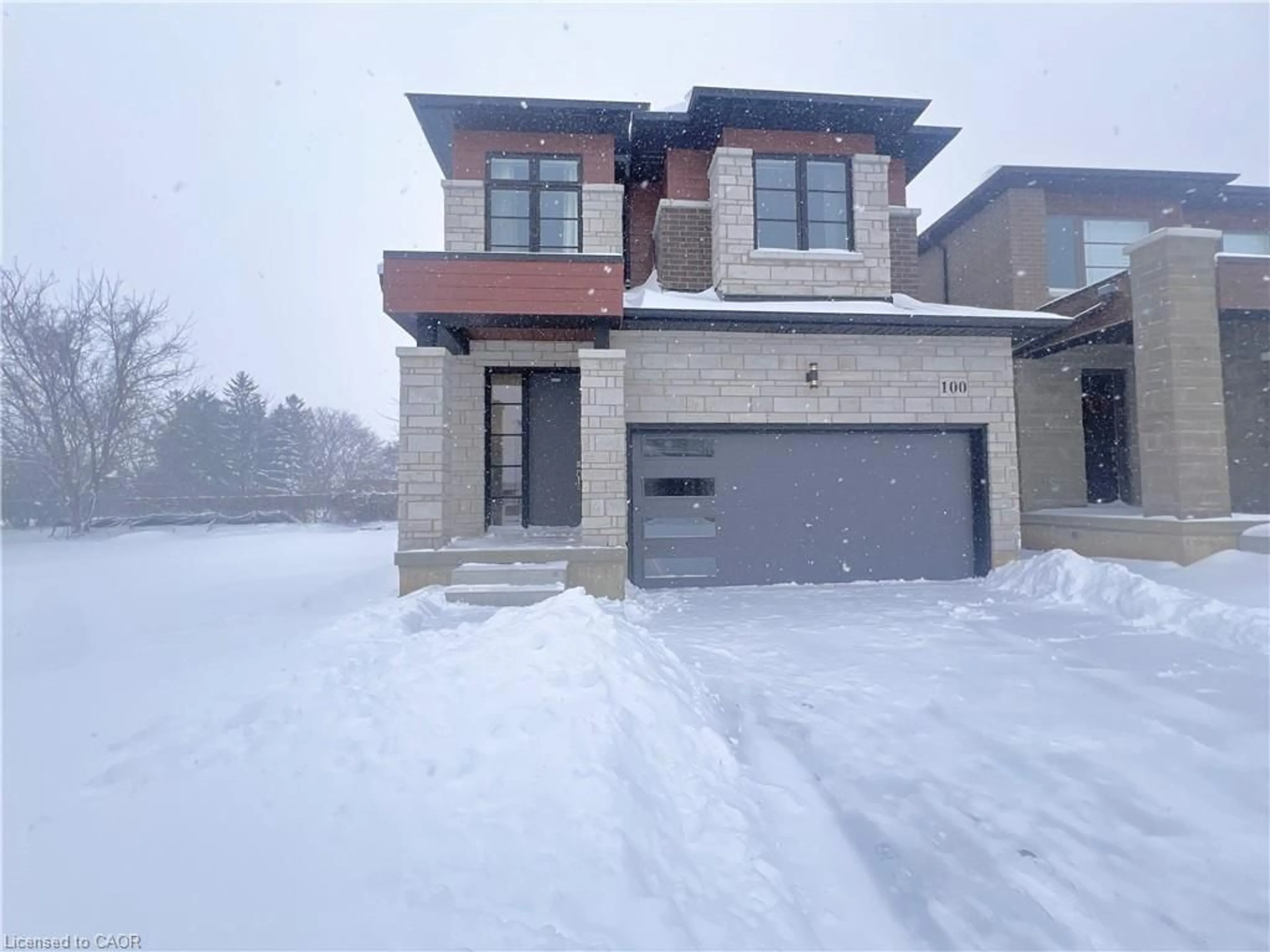 Home with brick exterior material, street for 100 Shady Oaks Trail, Hamilton Ontario L9B 0K6