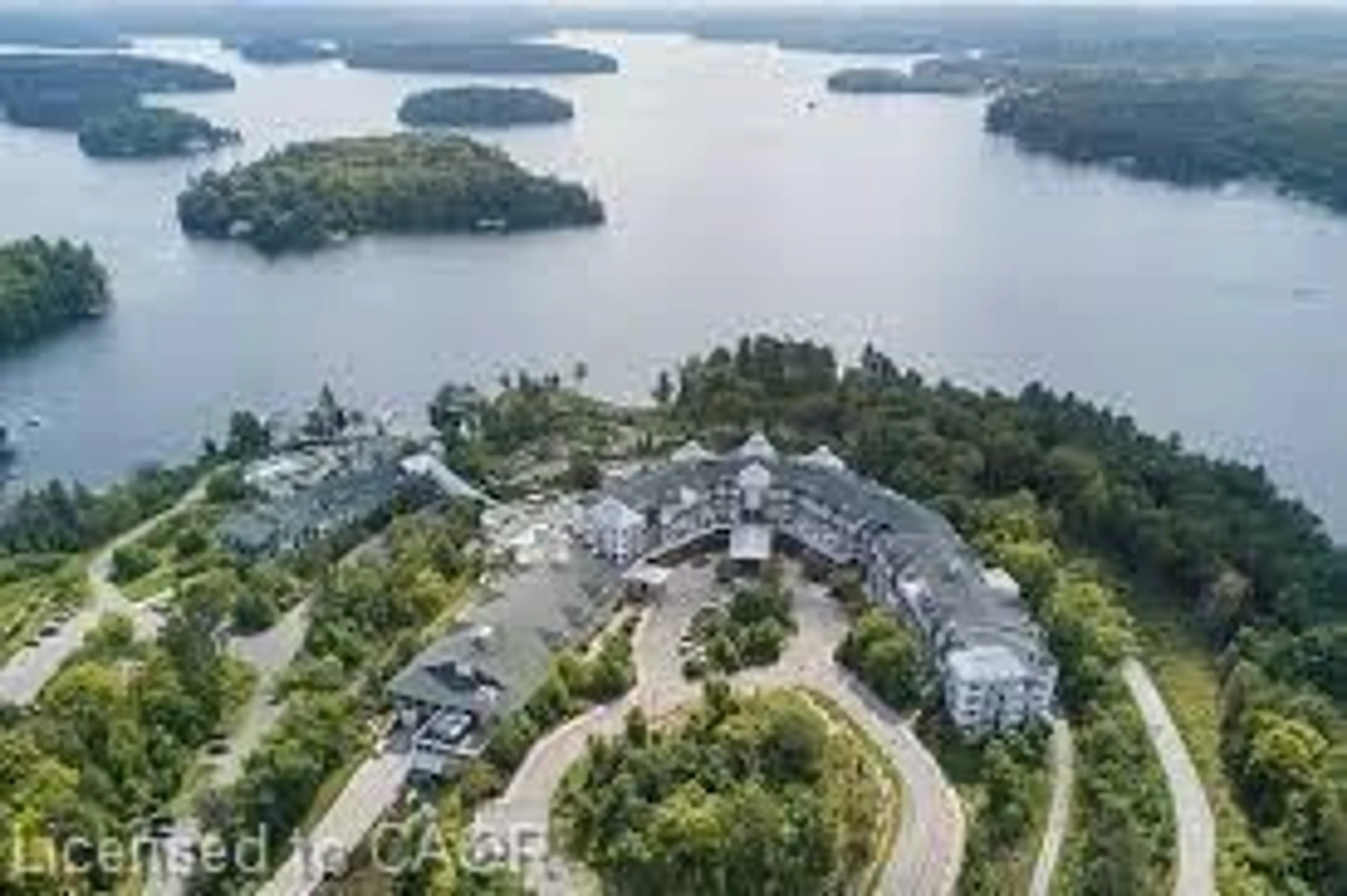 A pic from outside/outdoor area/front of a property/back of a property/a pic from drone, water/lake/river/ocean view for 1050 Paignton House Rd #1326, Minett Ontario P0B 1G0
