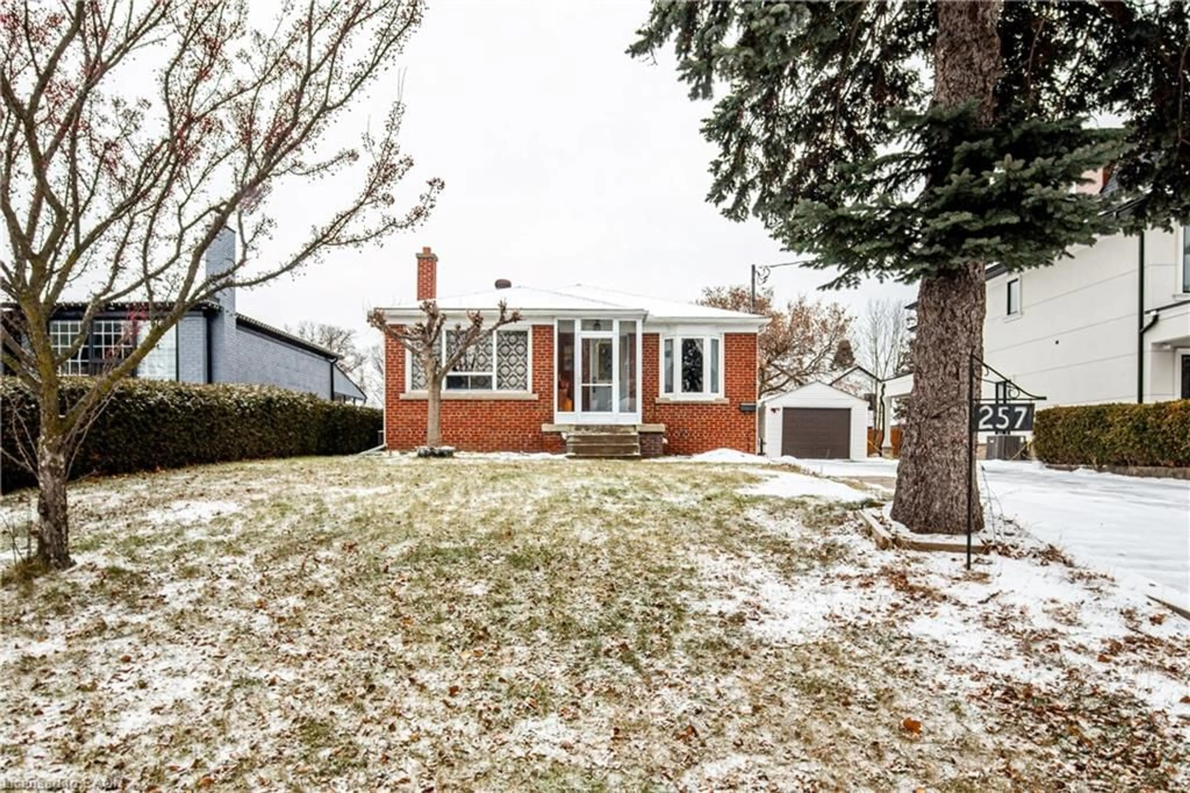 Home with brick exterior material, street for 257 Woodale Ave, Oakville Ontario L6K 2N3