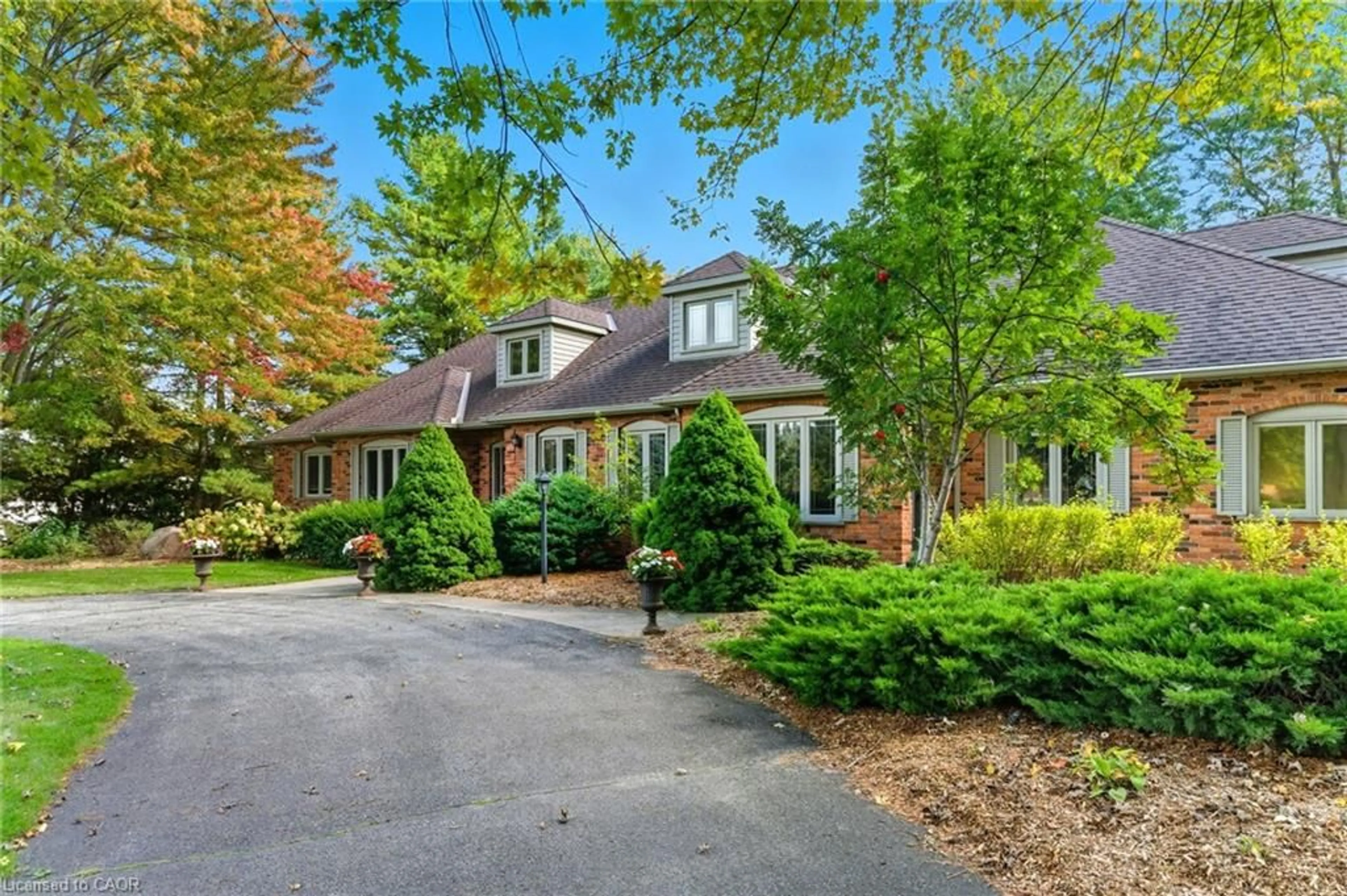 Home with brick exterior material, street for 55 Bridle Path, Puslinch Ontario N0B 2J0