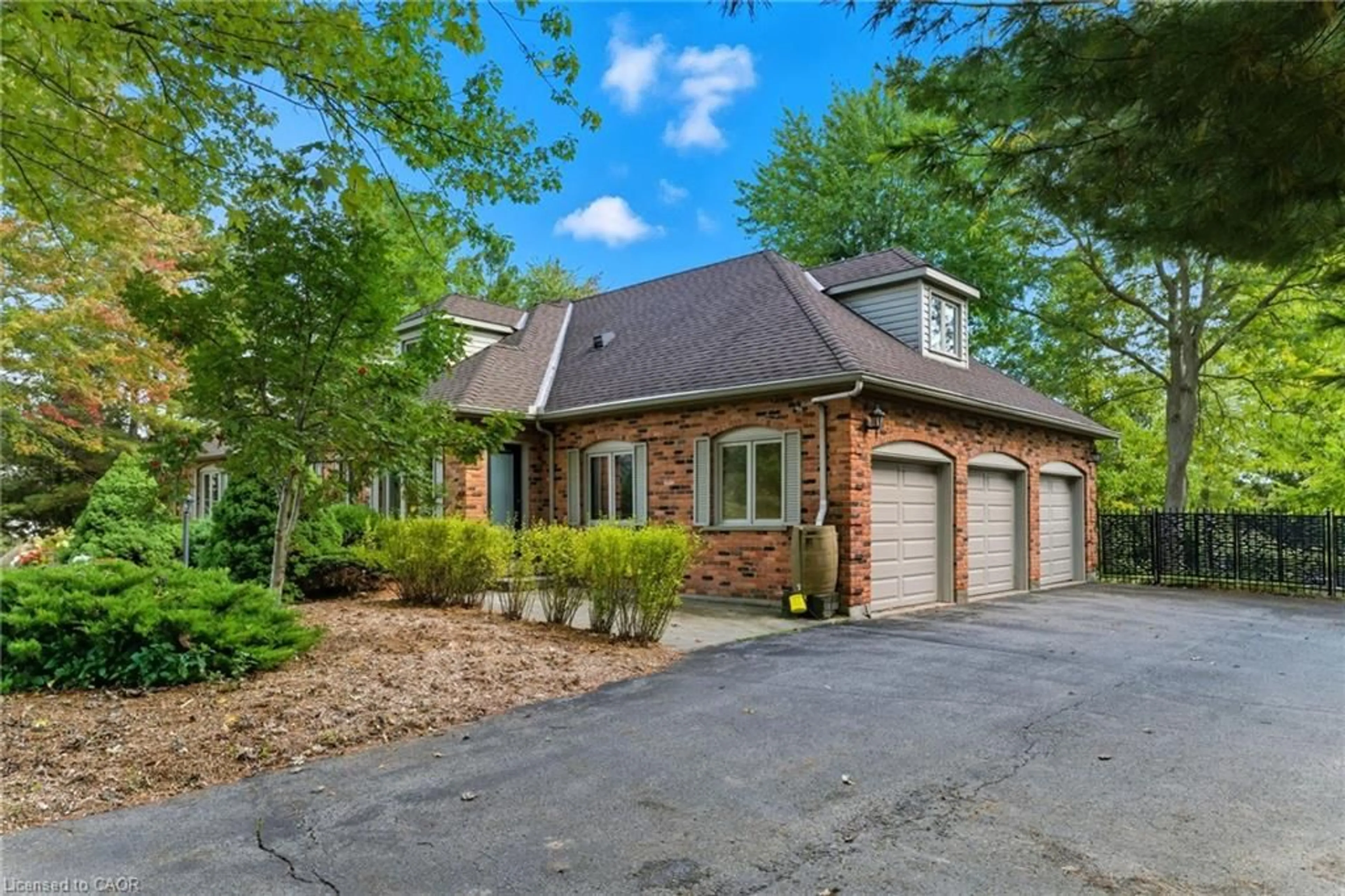 Home with brick exterior material, street for 55 Bridle Path, Puslinch Ontario N0B 2J0