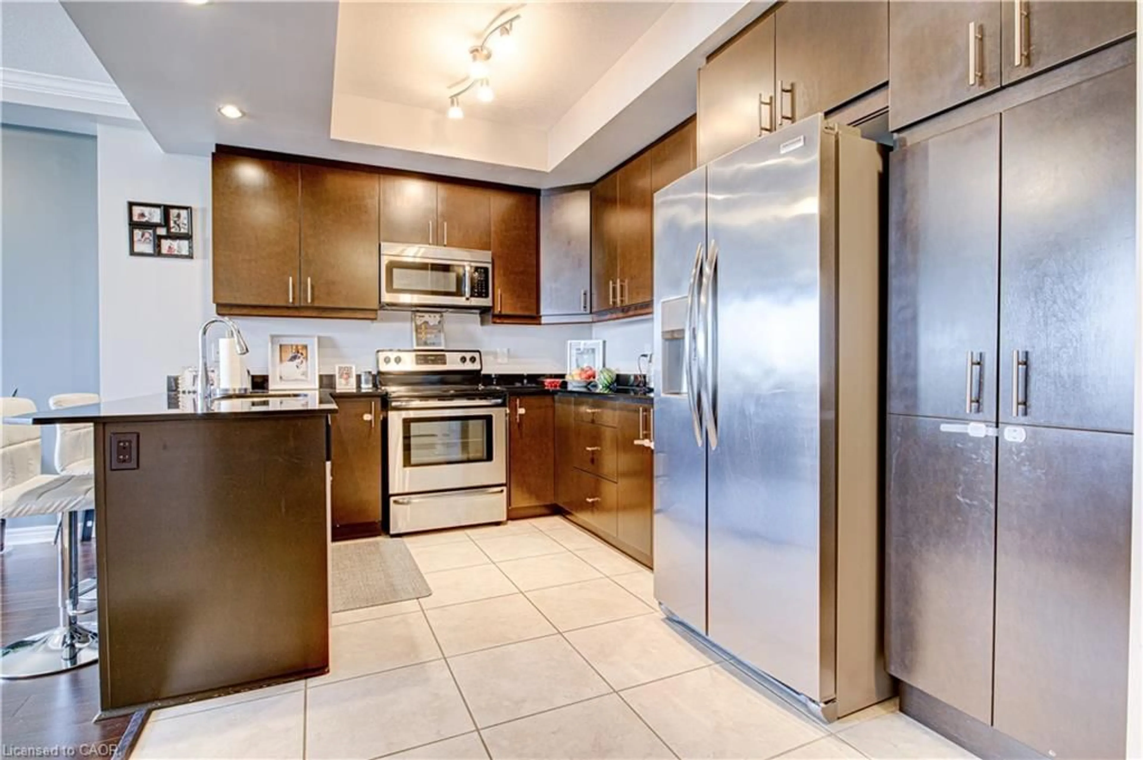 Standard kitchen, ceramic/tile floor for 539 Belmont Ave #1106, Kitchener Ontario N2M 0A2