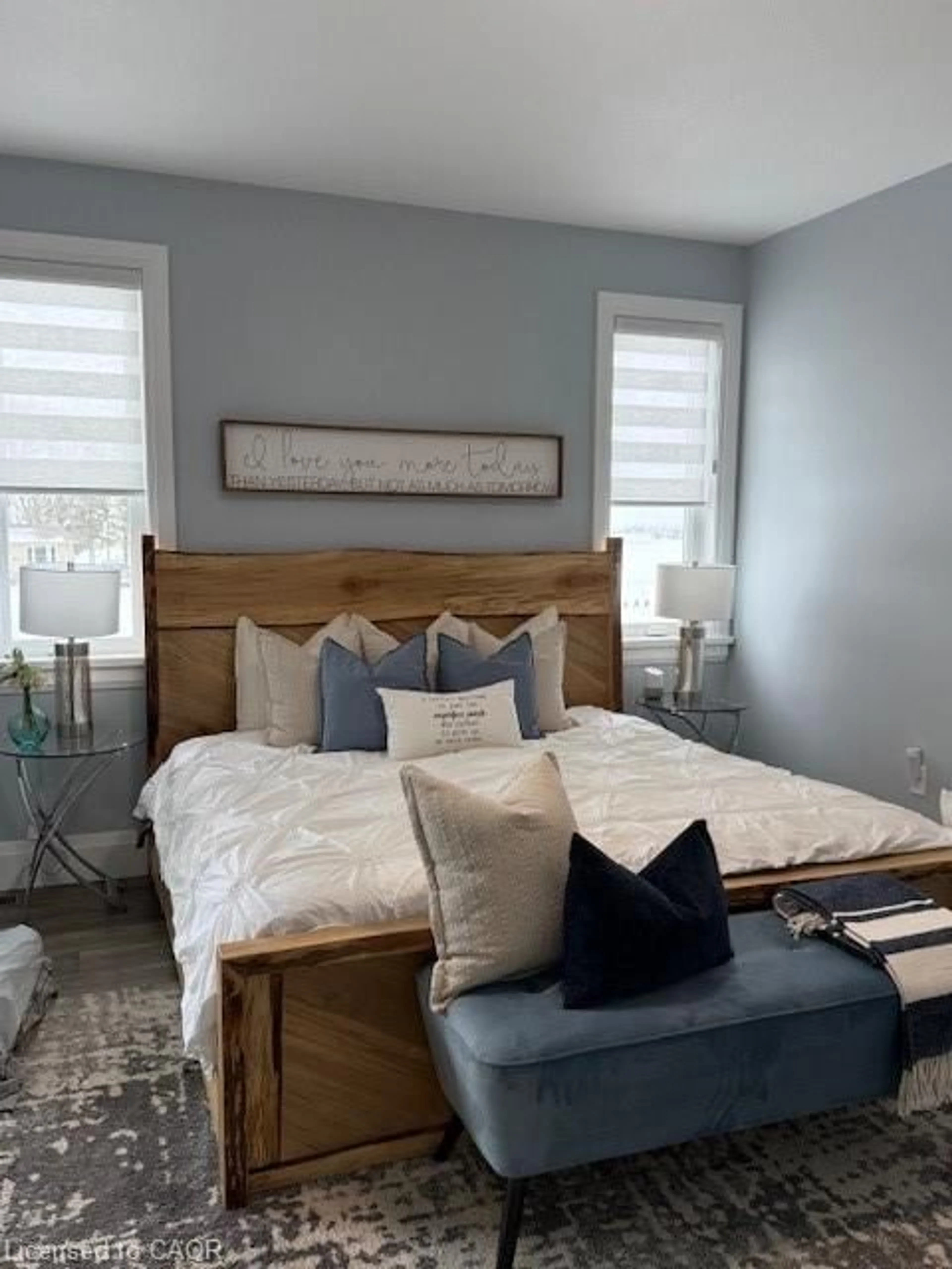 Bedroom with bed, wood/laminate floor for 21 Paxton St, Holyrood Ontario N0G 2B0