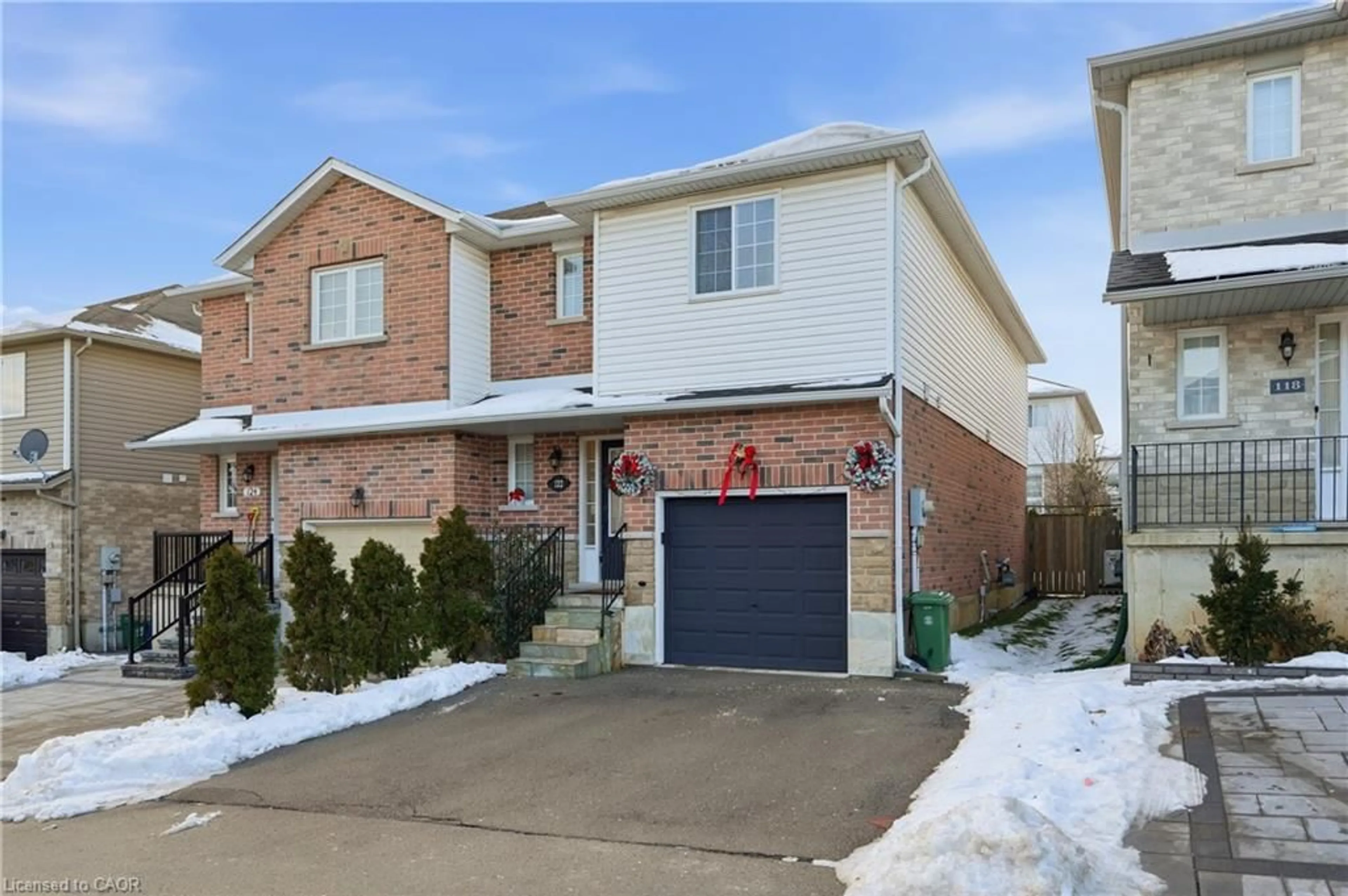 Home with brick exterior material, street for 122 Vennio Lane, Hamilton Ontario L9B 2Y7
