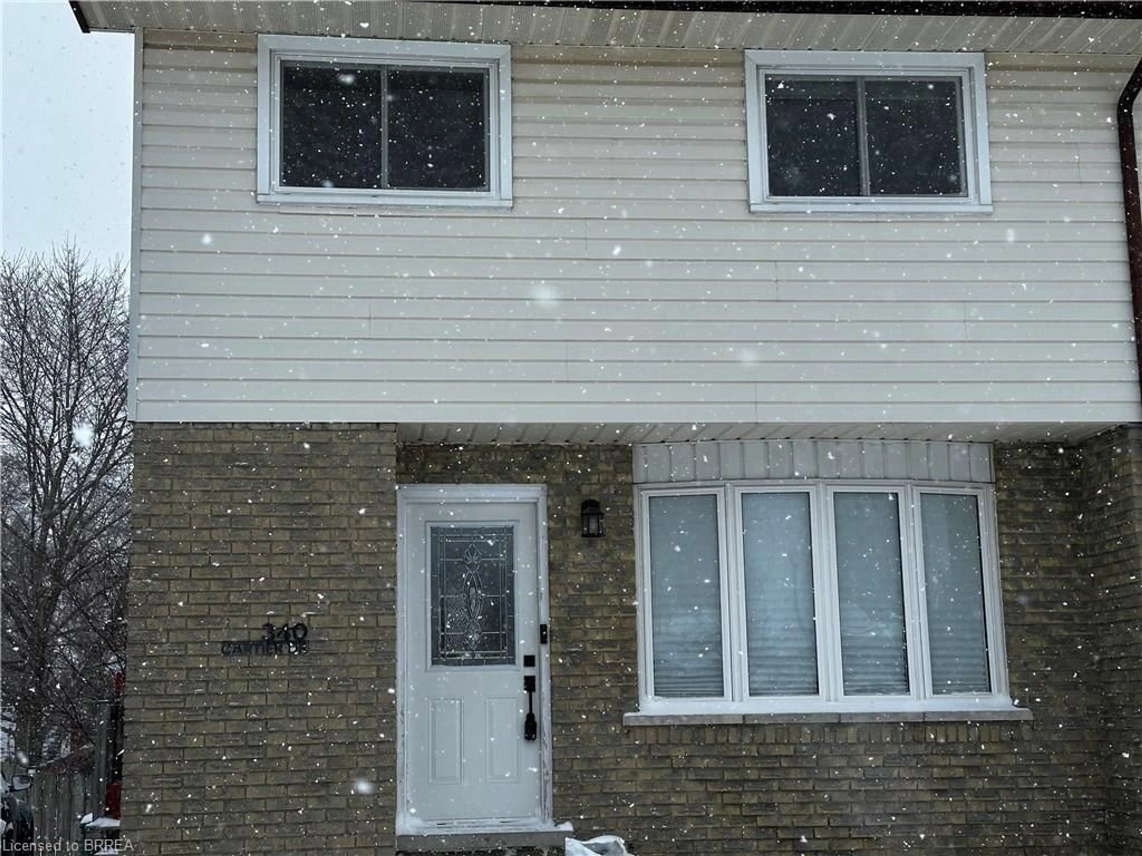 Home with vinyl exterior material, street for 340 Cartier Dr, Woodstock Ontario N4S 7V1