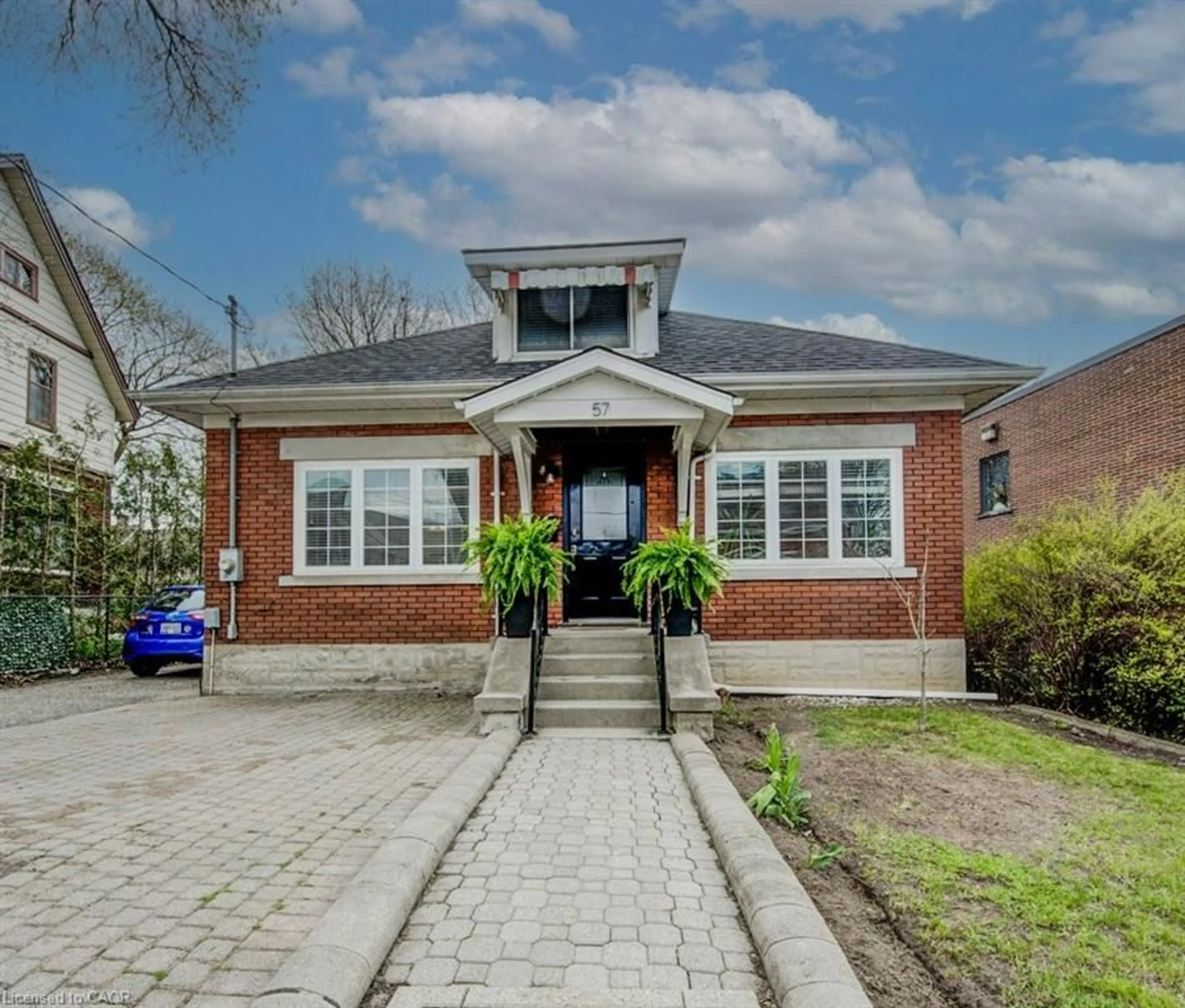 Home with brick exterior material, street for 57 Glasgow St, Kitchener Ontario N2G 2G8