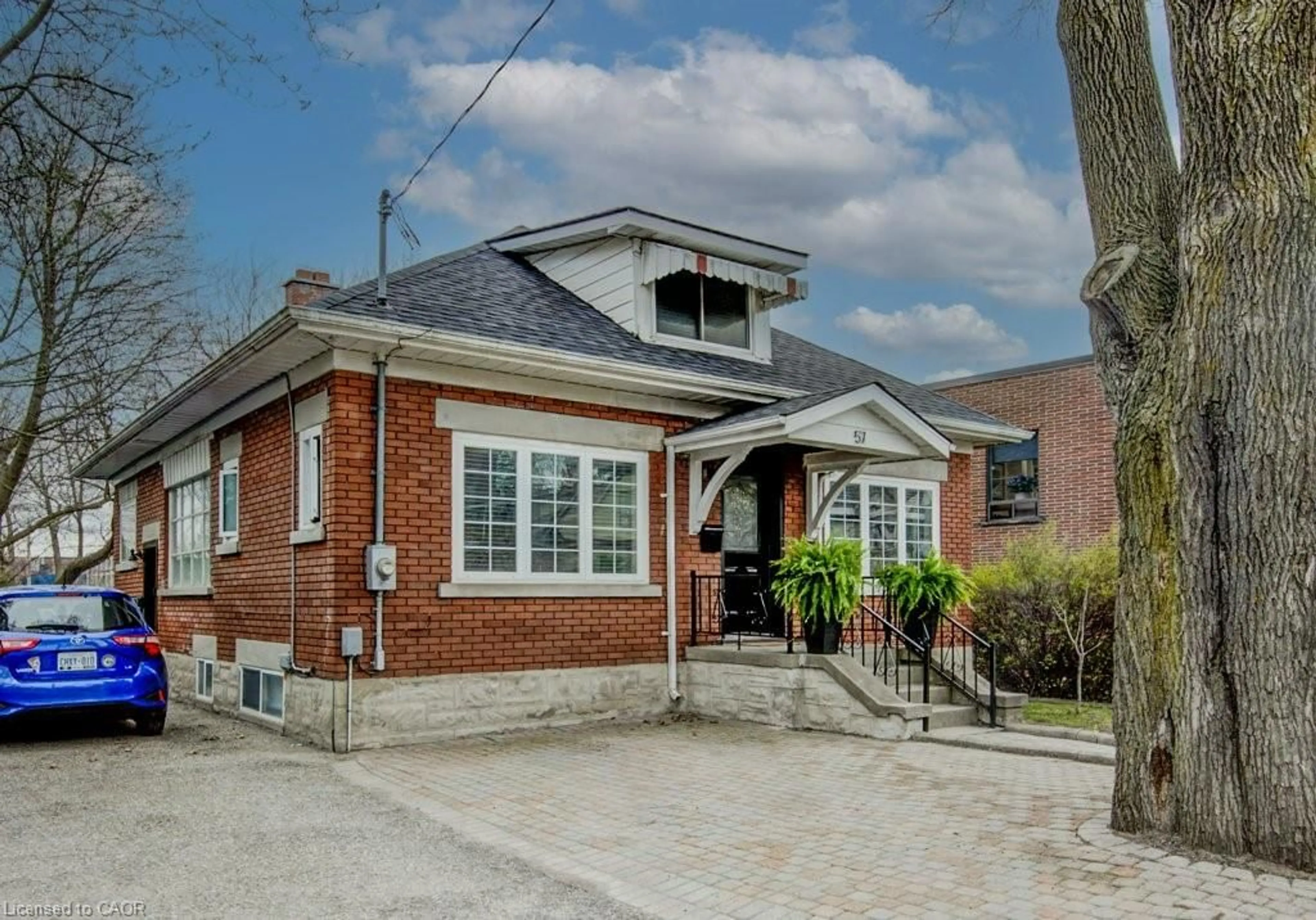 Home with brick exterior material, street for 57 Glasgow St, Kitchener Ontario N2G 2G8
