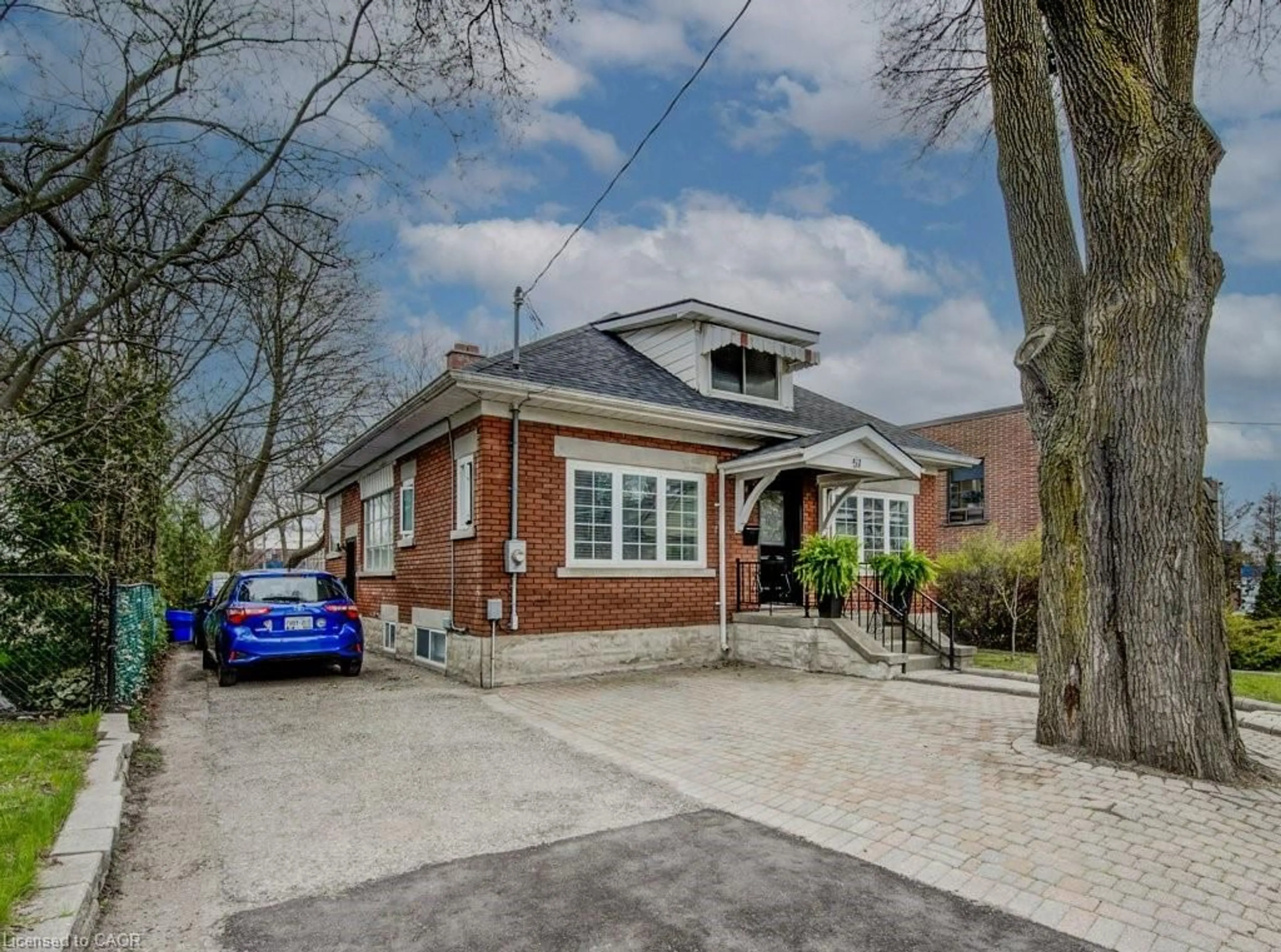 Home with brick exterior material, street for 57 Glasgow St, Kitchener Ontario N2G 2G8