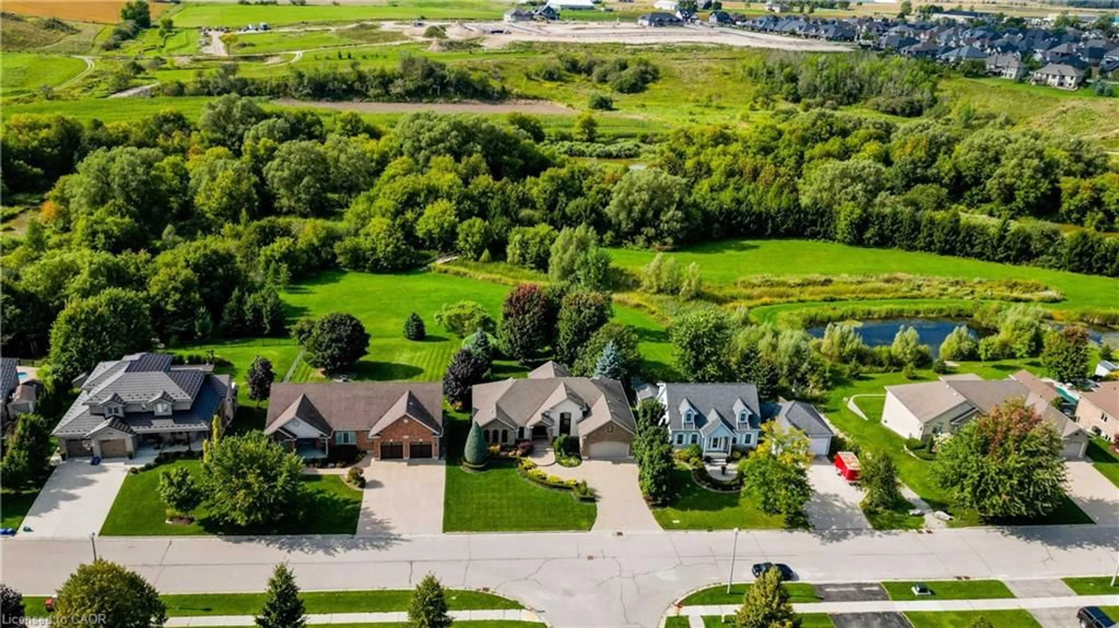 A pic from outside/outdoor area/front of a property/back of a property/a pic from drone, unknown for 118 River Run Rd, Drayton Ontario N0G 1P0