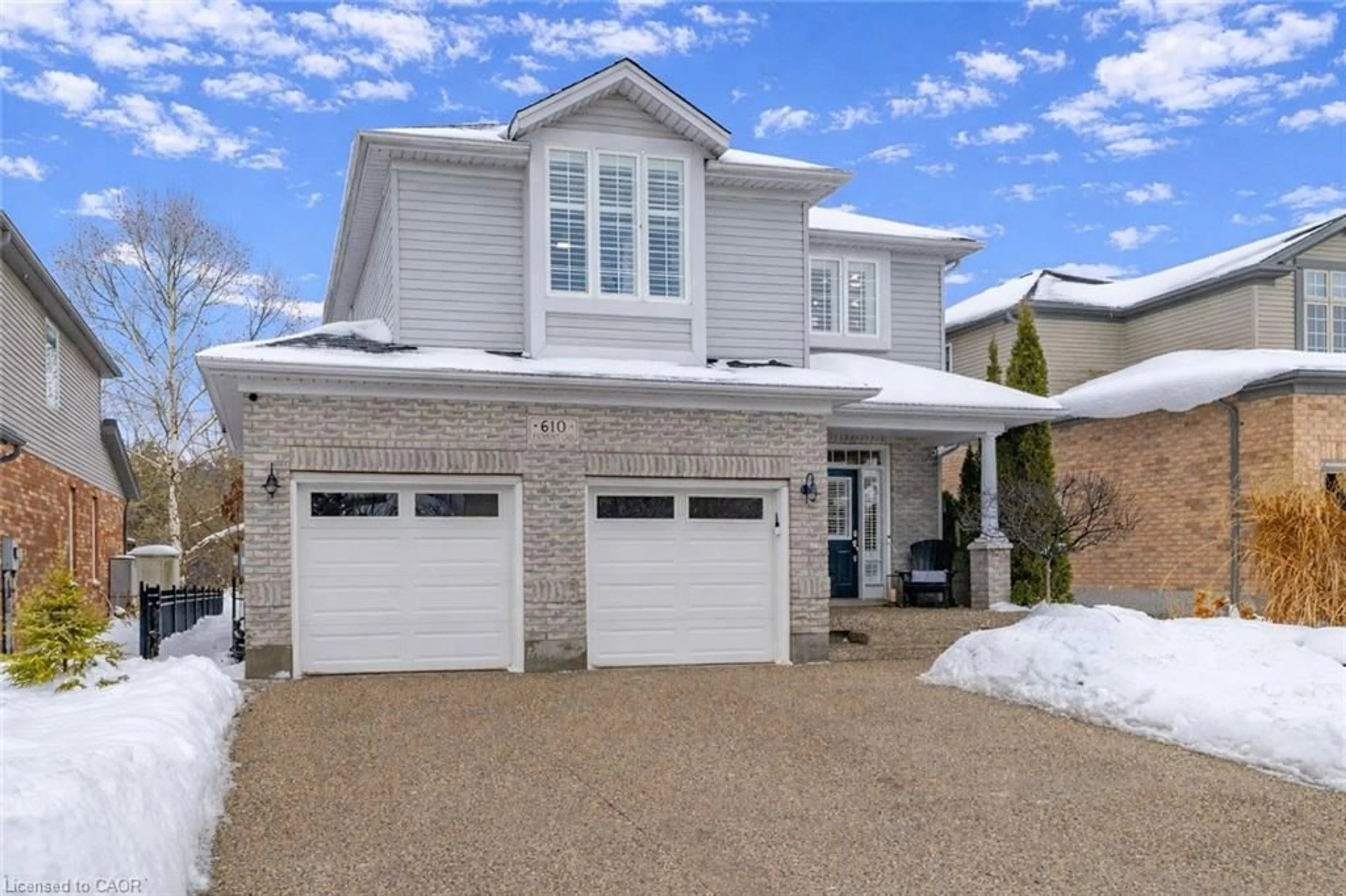 Home with brick exterior material, street for 610 Rock Point Cres, Waterloo Ontario N2V 2K3