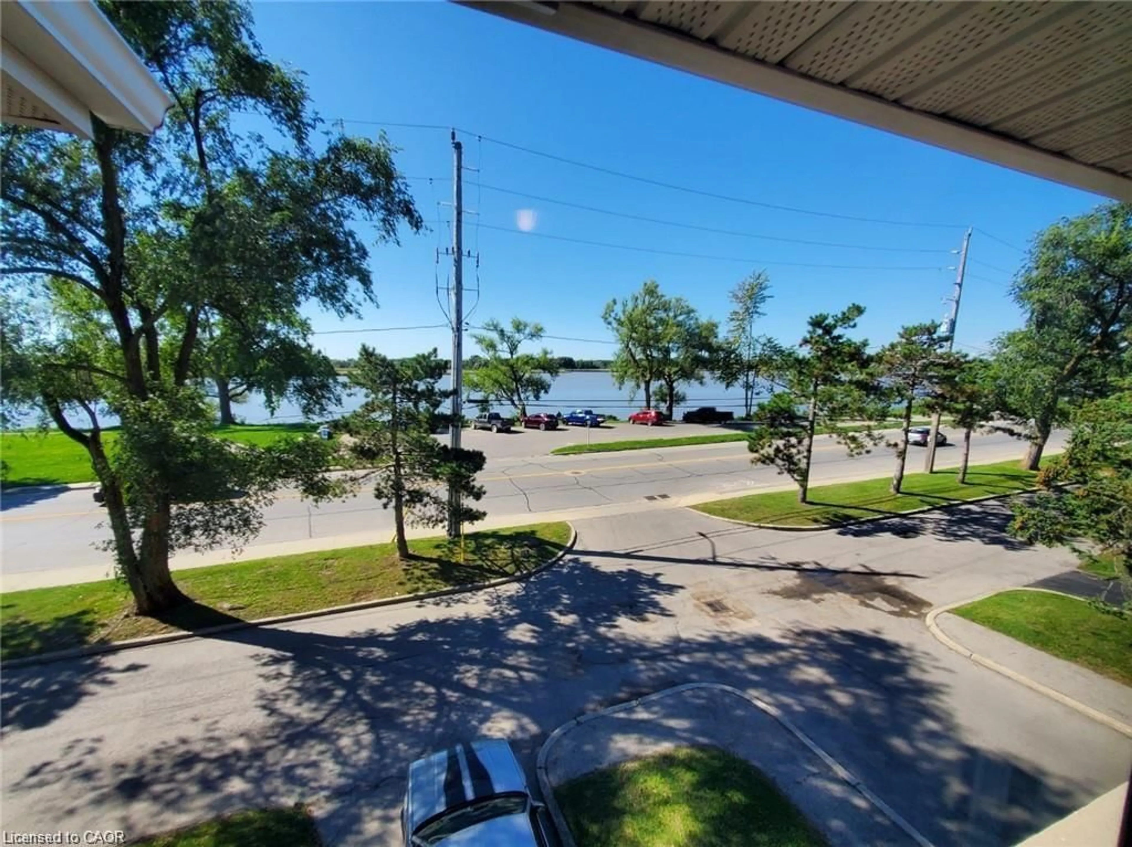A pic from outside/outdoor area/front of a property/back of a property/a pic from drone, water/lake/river/ocean view for 105 Main St, Dunnville Ontario N1A 3C8
