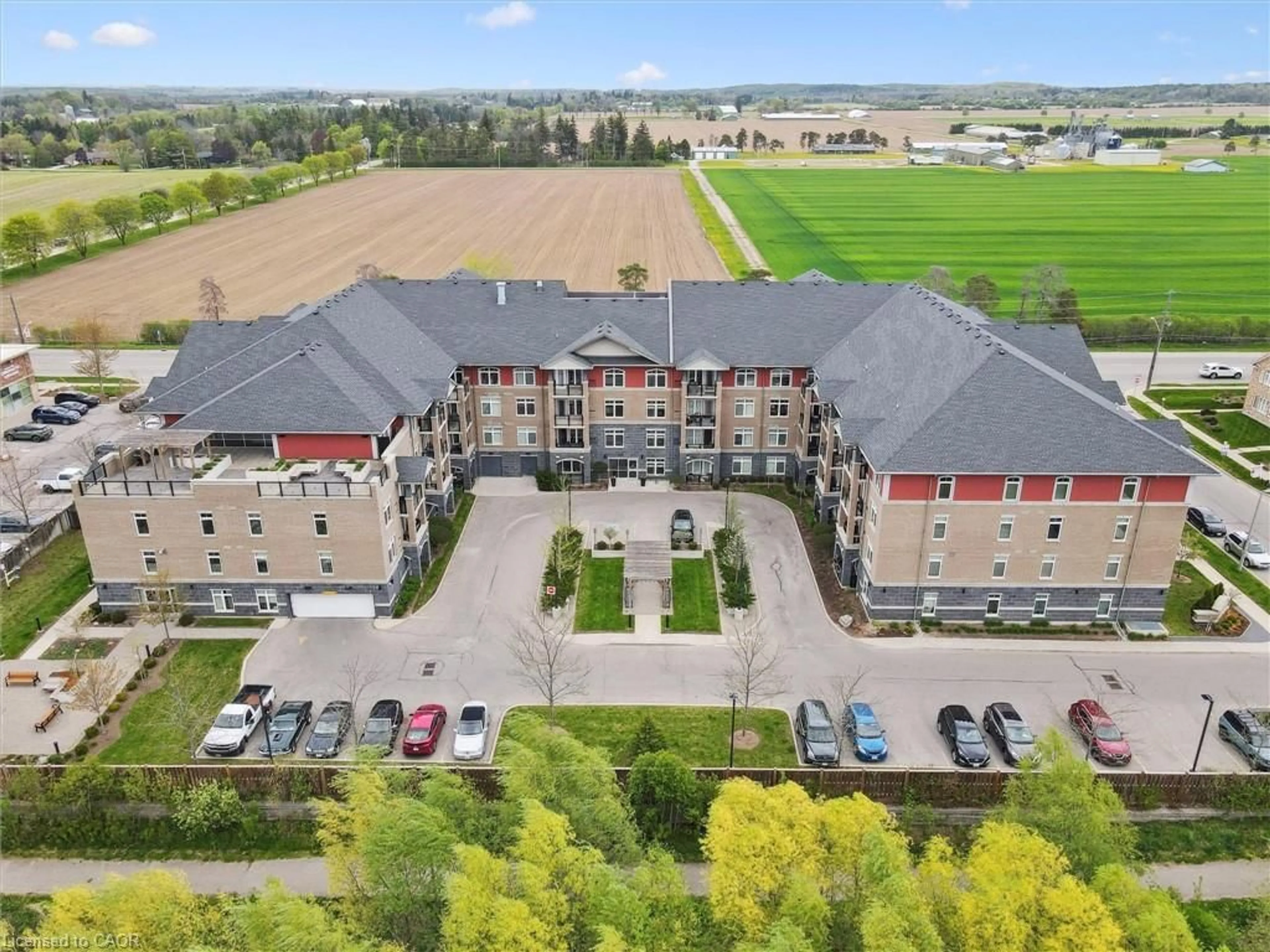 A pic from outside/outdoor area/front of a property/back of a property/a pic from drone, mountain view for 106 Bard Blvd #202, Guelph Ontario N1L 0L8