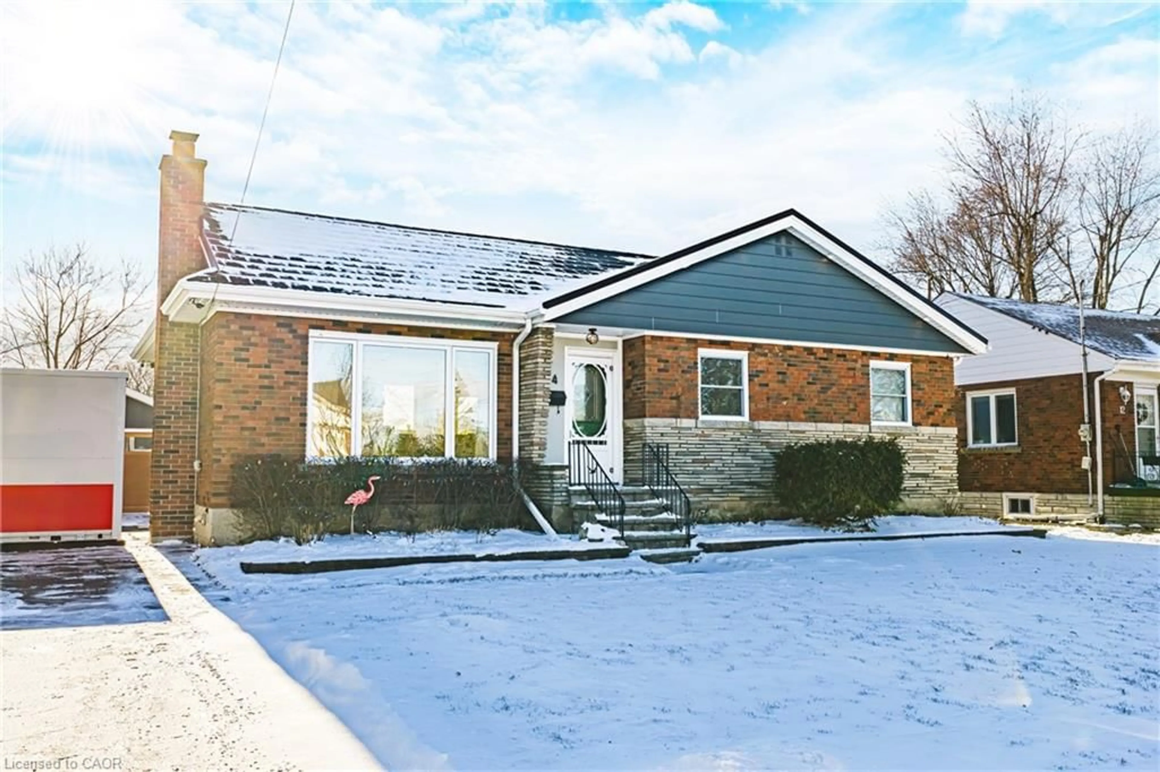 Home with brick exterior material, street for 14 Mulock Ave, Hamilton Ontario L8T 1H3
