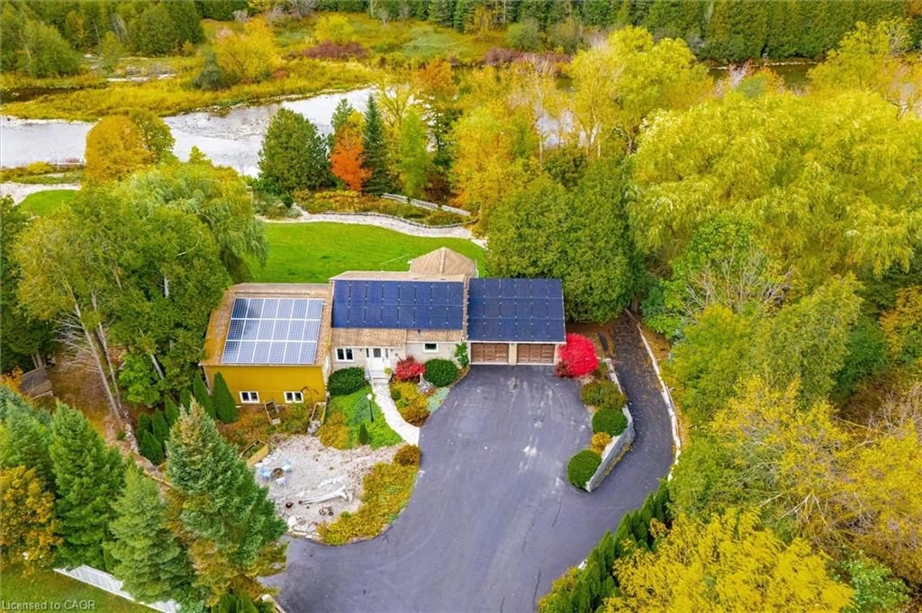 A pic from outside/outdoor area/front of a property/back of a property/a pic from drone, water/lake/river/ocean view for 8060 Wellington Rd 18, Fergus Ontario N1M 2W5