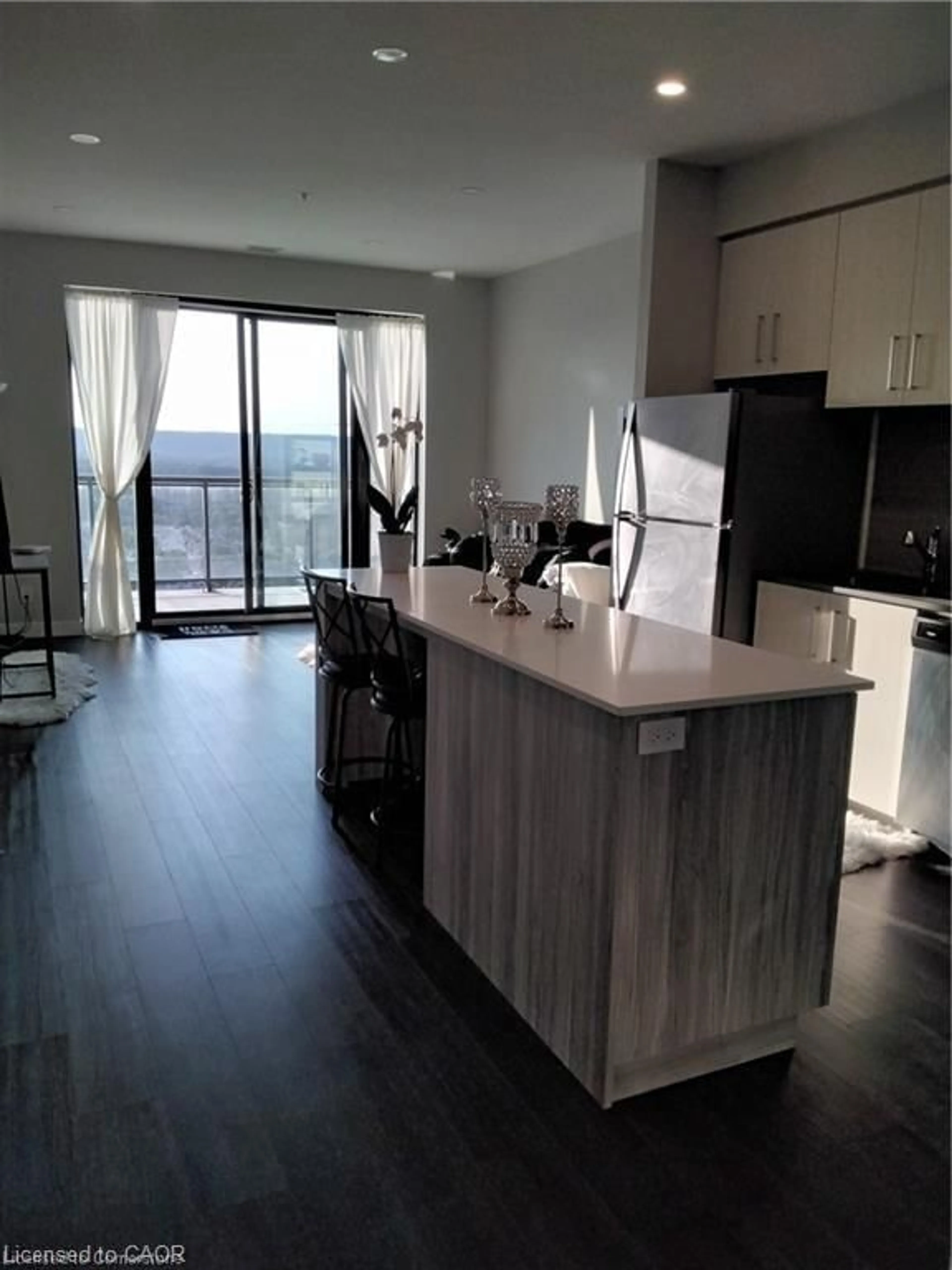 Open concept kitchen, wood/laminate floor for 15 Queen St #2304, Hamilton Ontario L8P 0C6