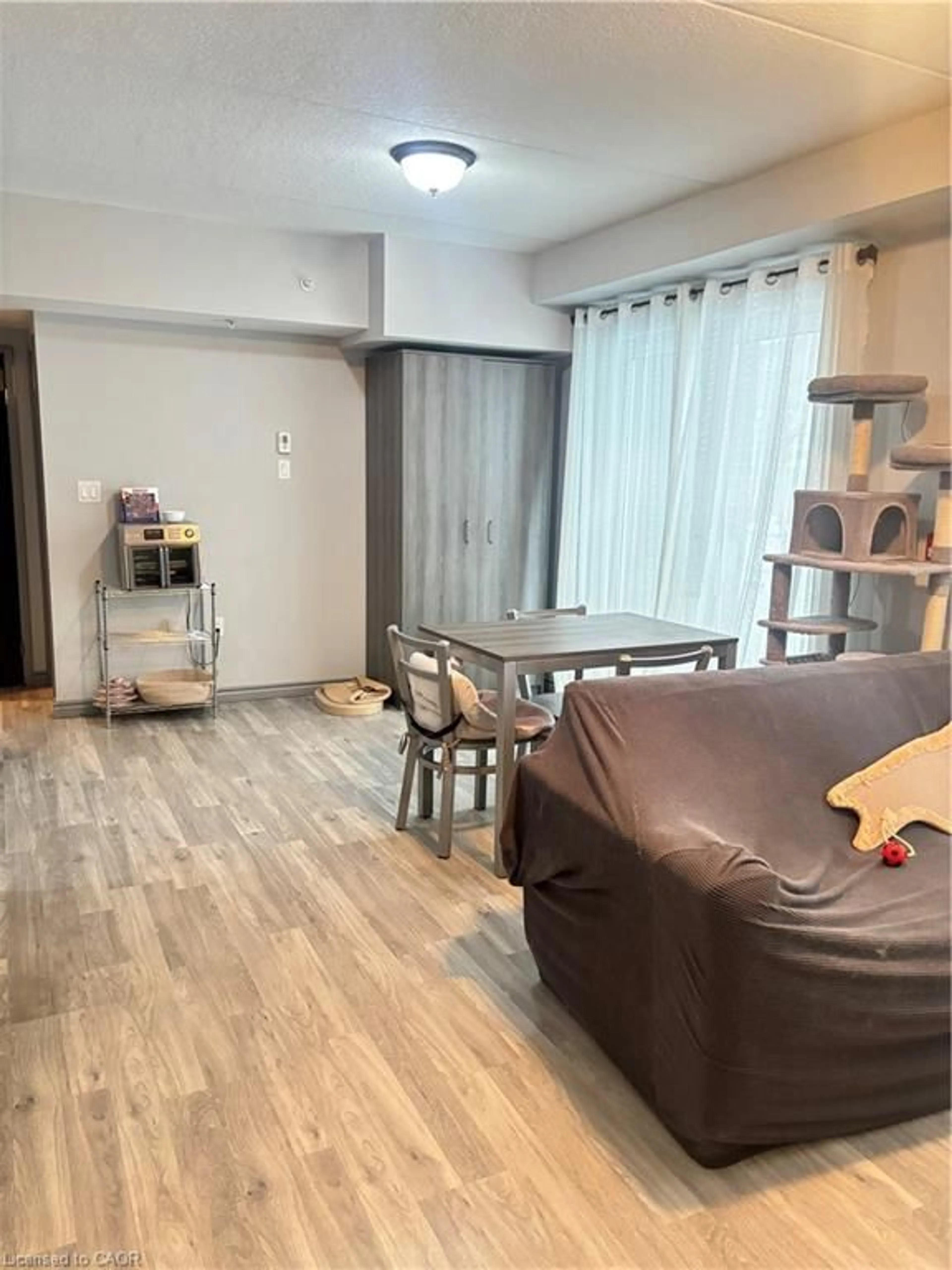 Living room with furniture, unknown for 275 Larch St #108, Waterloo Ontario N2L 3R2