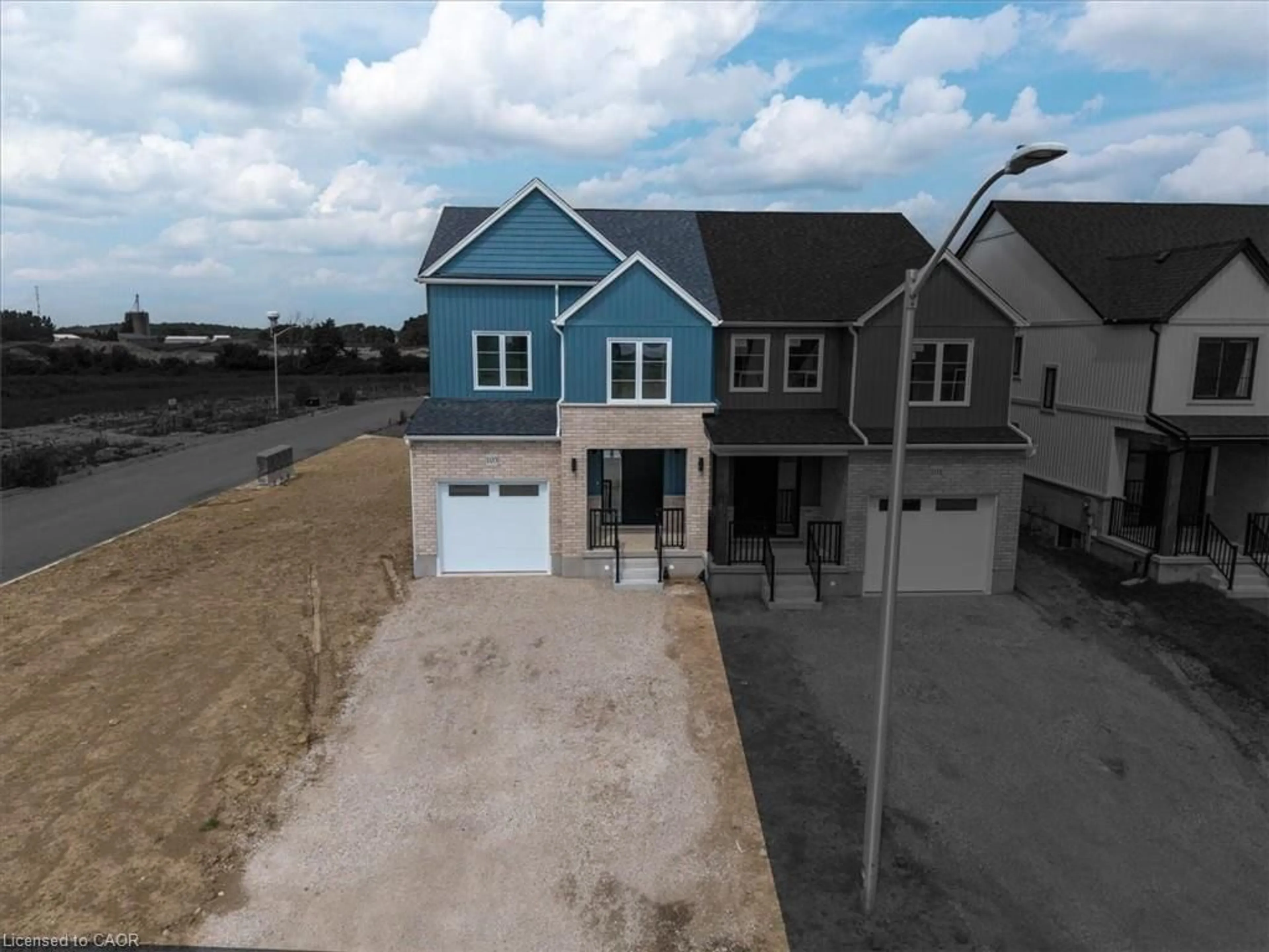 A pic from outside/outdoor area/front of a property/back of a property/a pic from drone, unknown for 103 Clayton St, Mitchell Ontario N0K 1N0