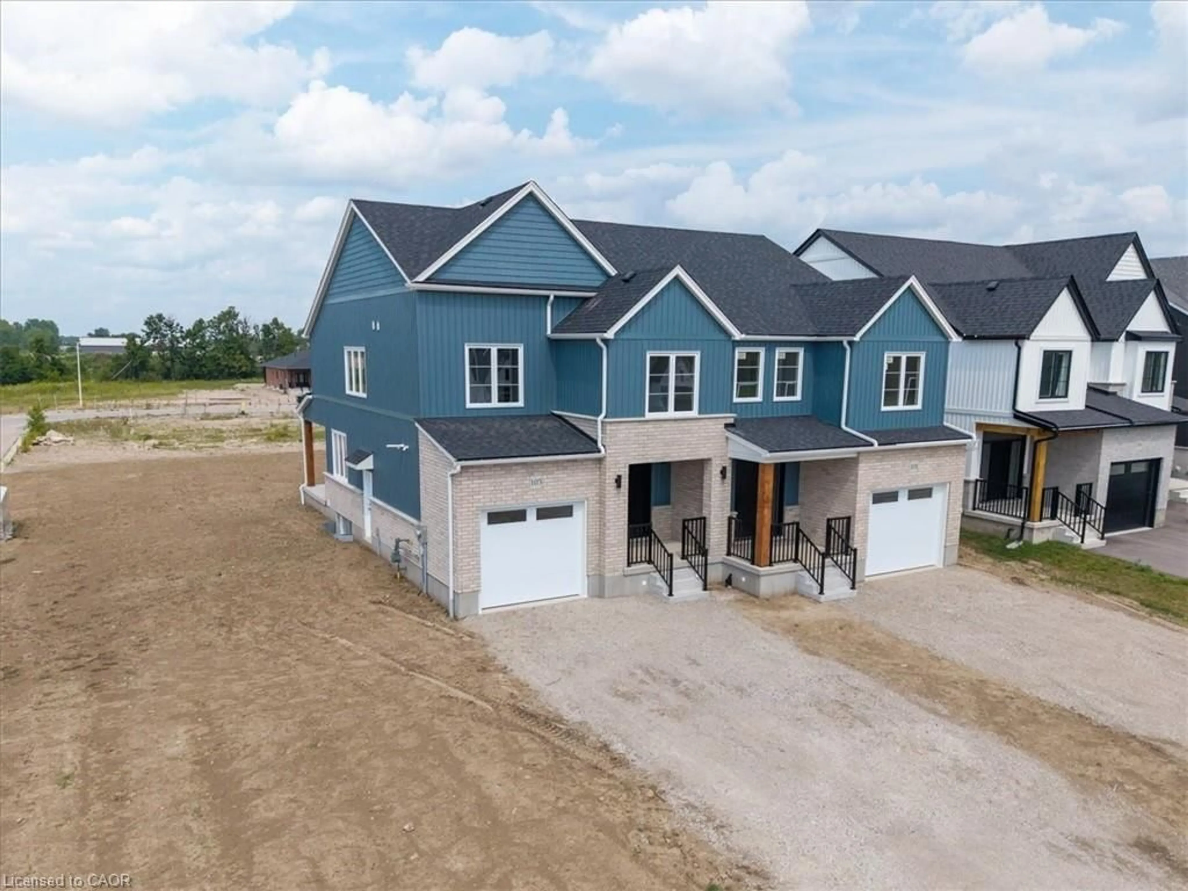 A pic from outside/outdoor area/front of a property/back of a property/a pic from drone, building for 103 Clayton St, Mitchell Ontario N0K 1N0