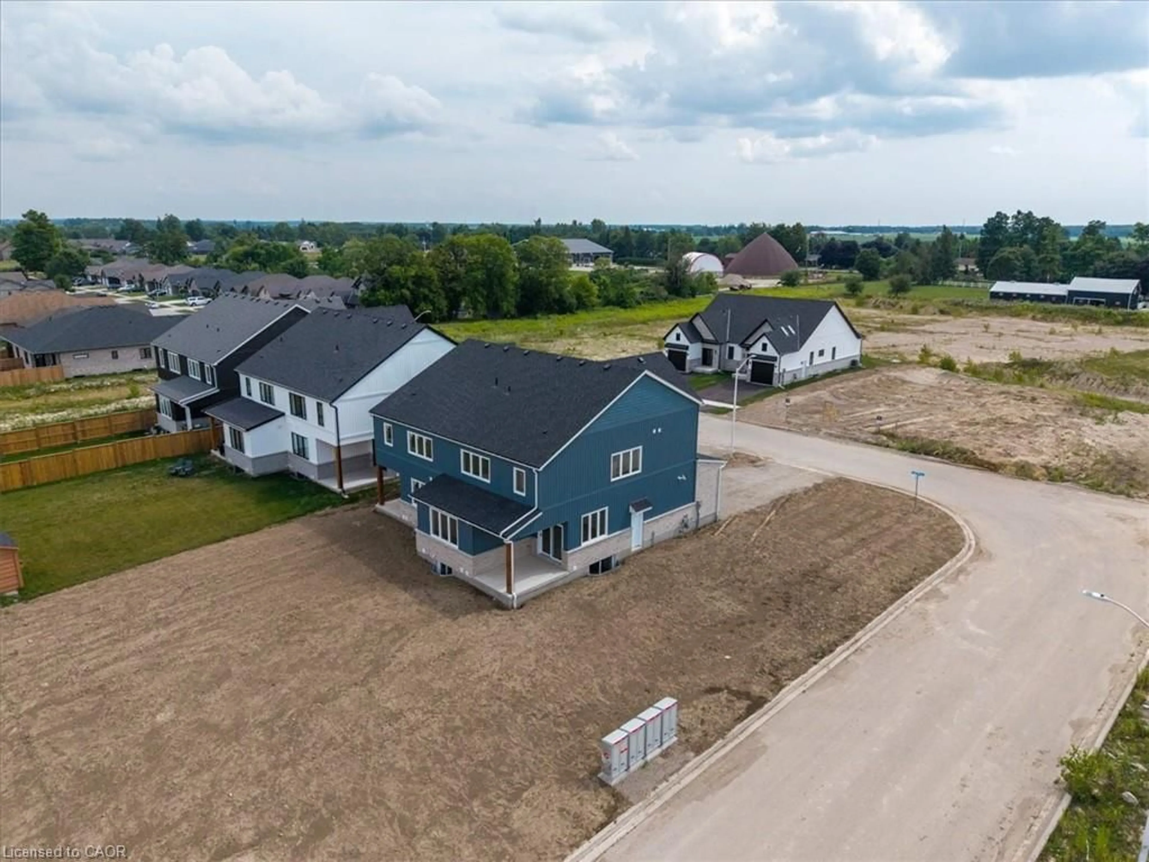 A pic from outside/outdoor area/front of a property/back of a property/a pic from drone, unknown for 103 Clayton St, Mitchell Ontario N0K 1N0