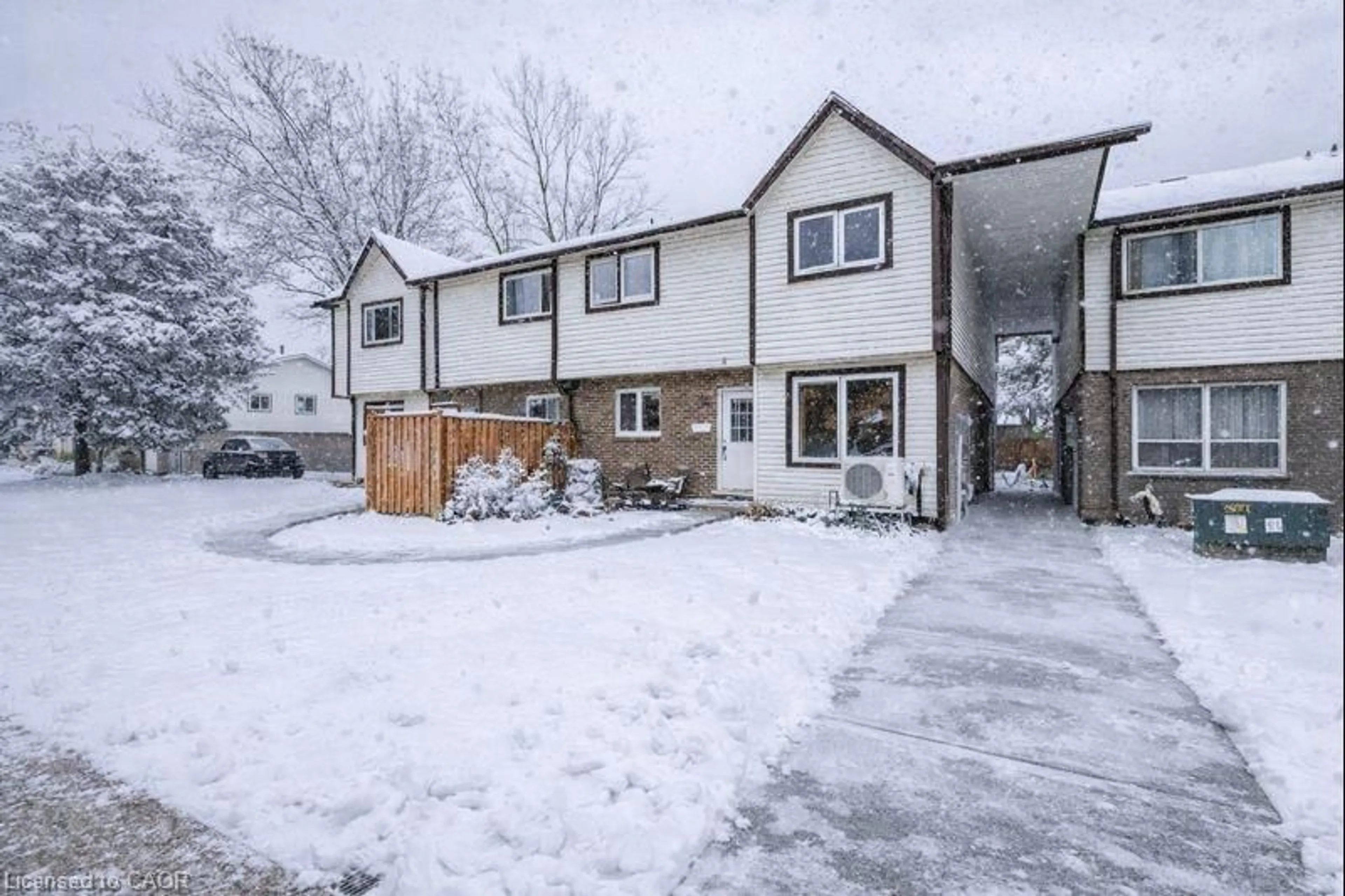 A pic from outside/outdoor area/front of a property/back of a property/a pic from drone, street for 445 Pioneer Dr #4, Kitchener Ontario N2P 1L8