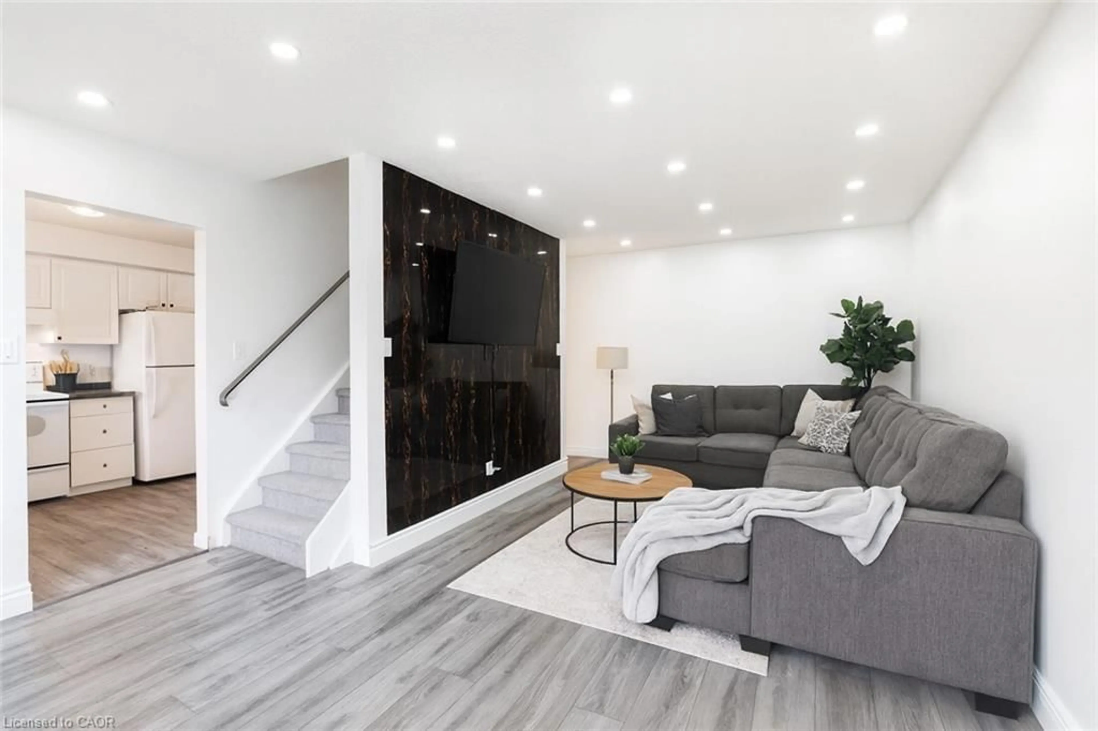 Living room with furniture, unknown for 445 Pioneer Dr #4, Kitchener Ontario N2P 1L8