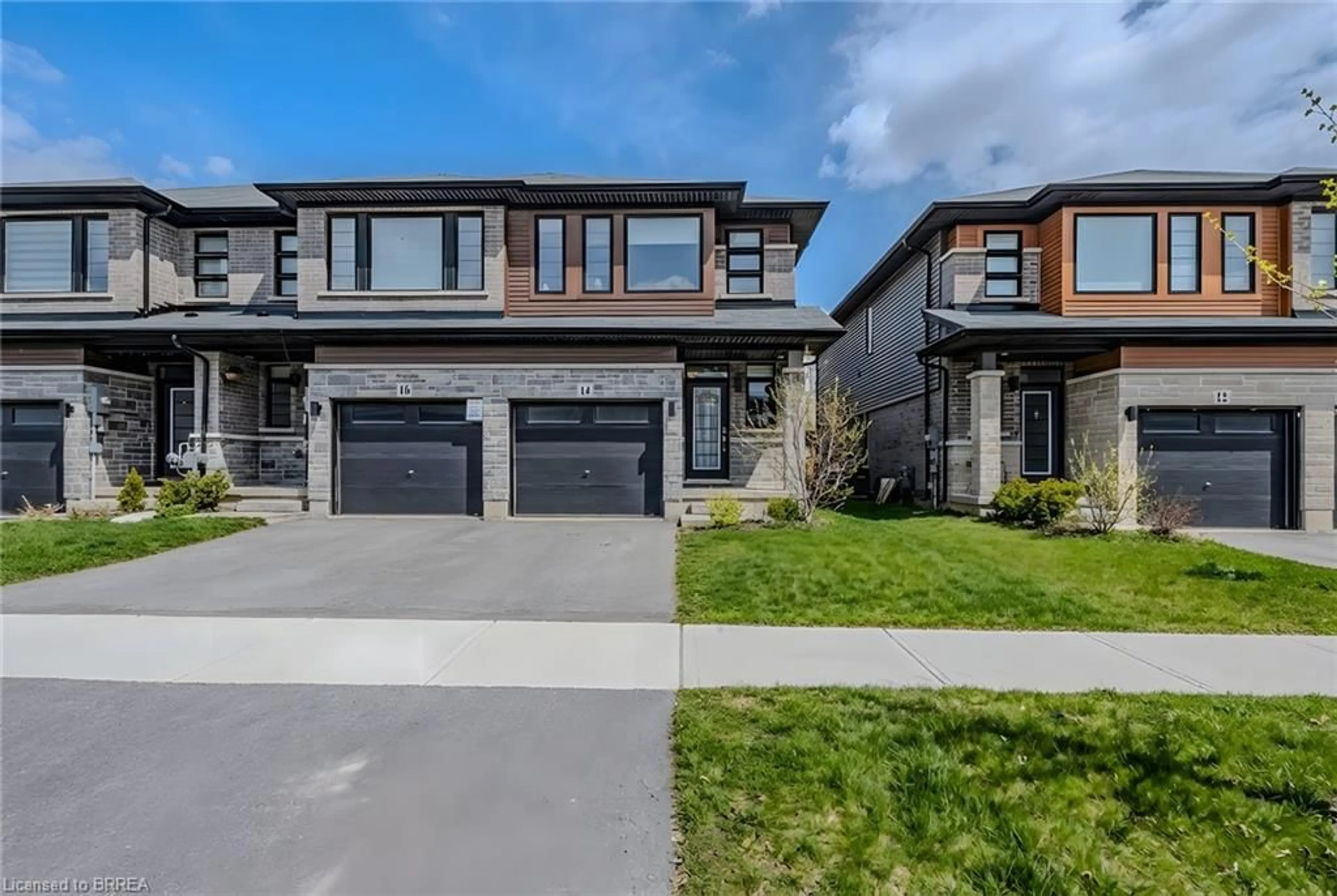 Home with brick exterior material, street for 14 June Callwood Way, Brantford Ontario N3T 0T7