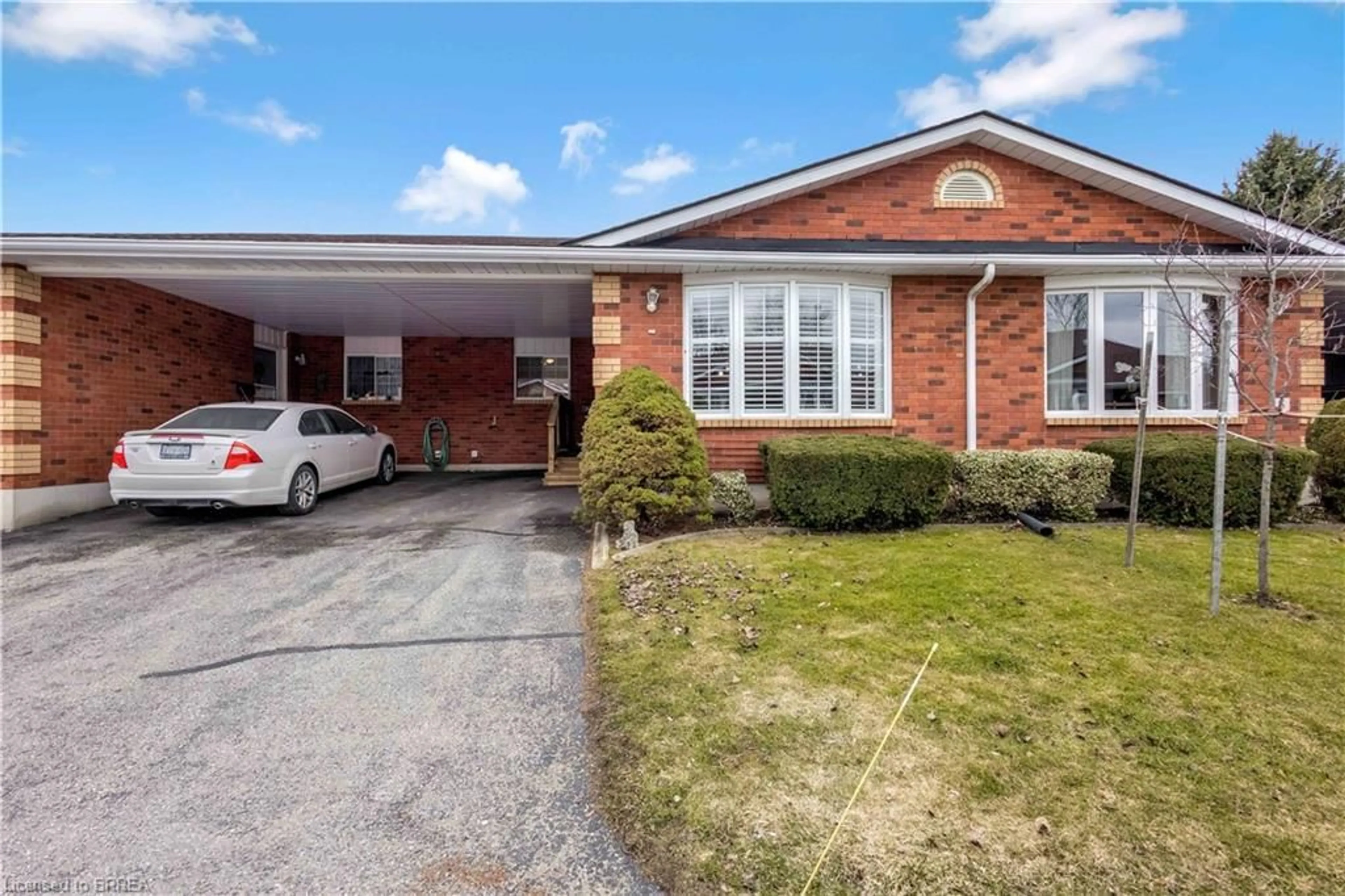Home with brick exterior material, street for 20 Courtland Dr #14, Brantford Ontario N3R 7Y2