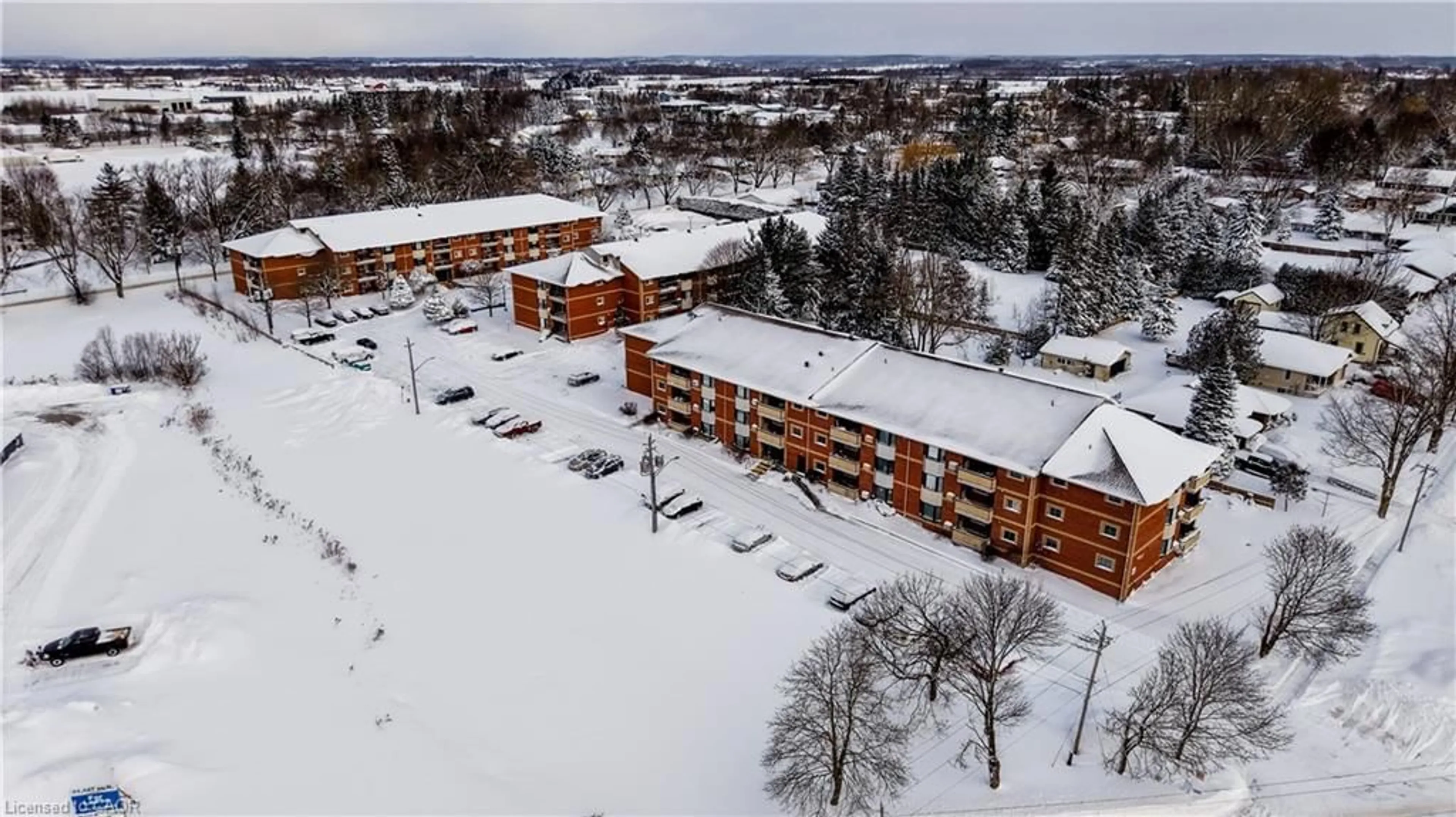 A pic from outside/outdoor area/front of a property/back of a property/a pic from drone, building for 460 Durham St #309, Mount Forest Ontario N0G 2L1