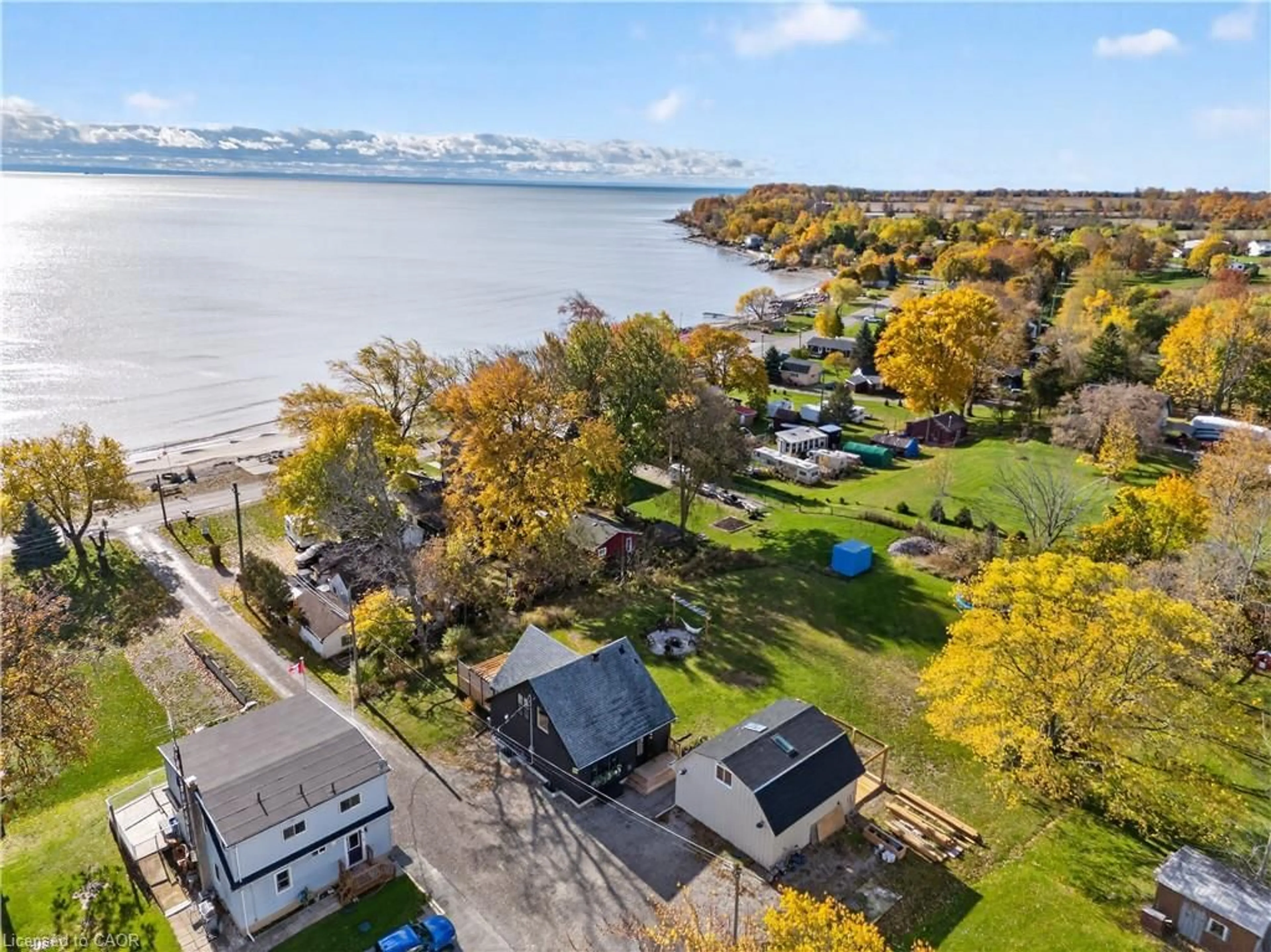 A pic from outside/outdoor area/front of a property/back of a property/a pic from drone, water/lake/river/ocean view for 5 Lees Line, Lowbanks Ontario N0A 1K0
