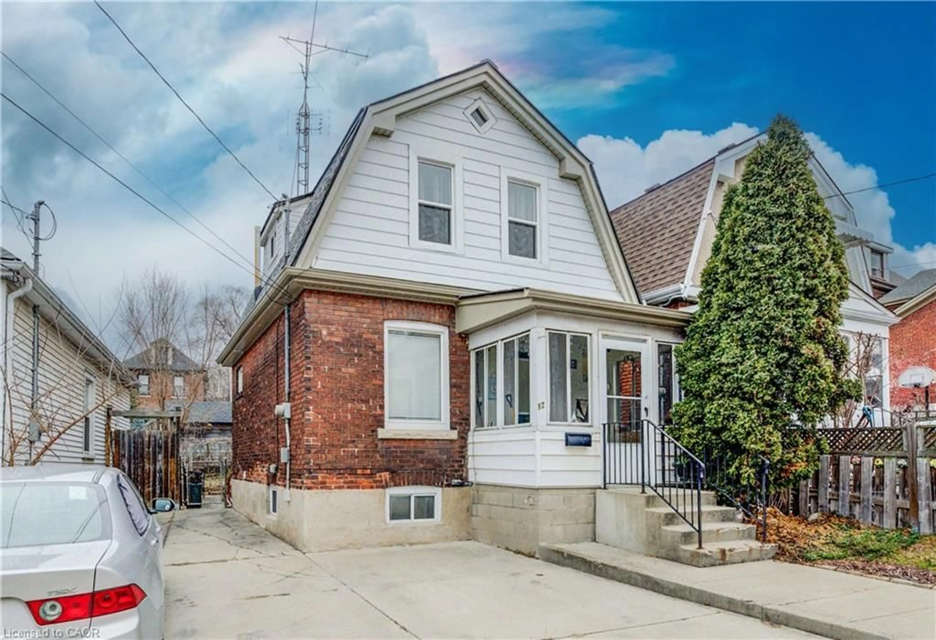 Home with brick exterior material, street for 12 Baker St, Hamilton Ontario L8R 1V3