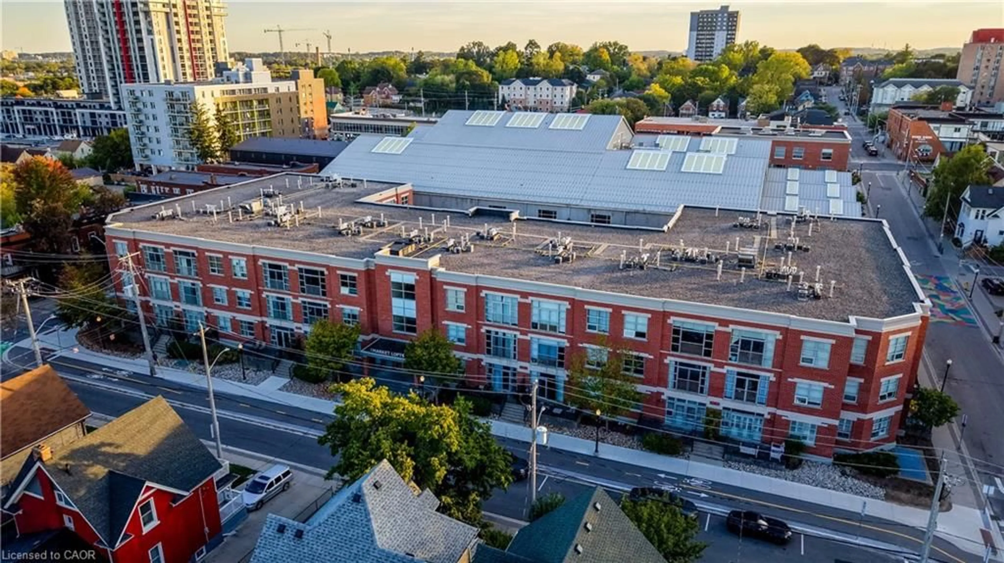 A pic from outside/outdoor area/front of a property/back of a property/a pic from drone, city buildings view from balcony for 165 Duke St #105, Kitchener Ontario N2H 6T8